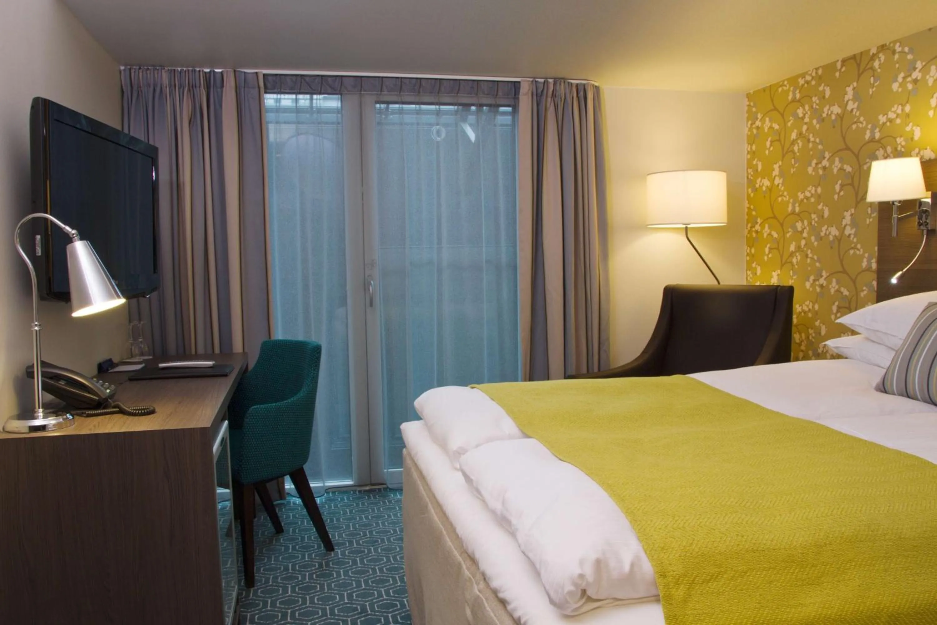 Photo of the whole room, Bed in Scandic Bakklandet