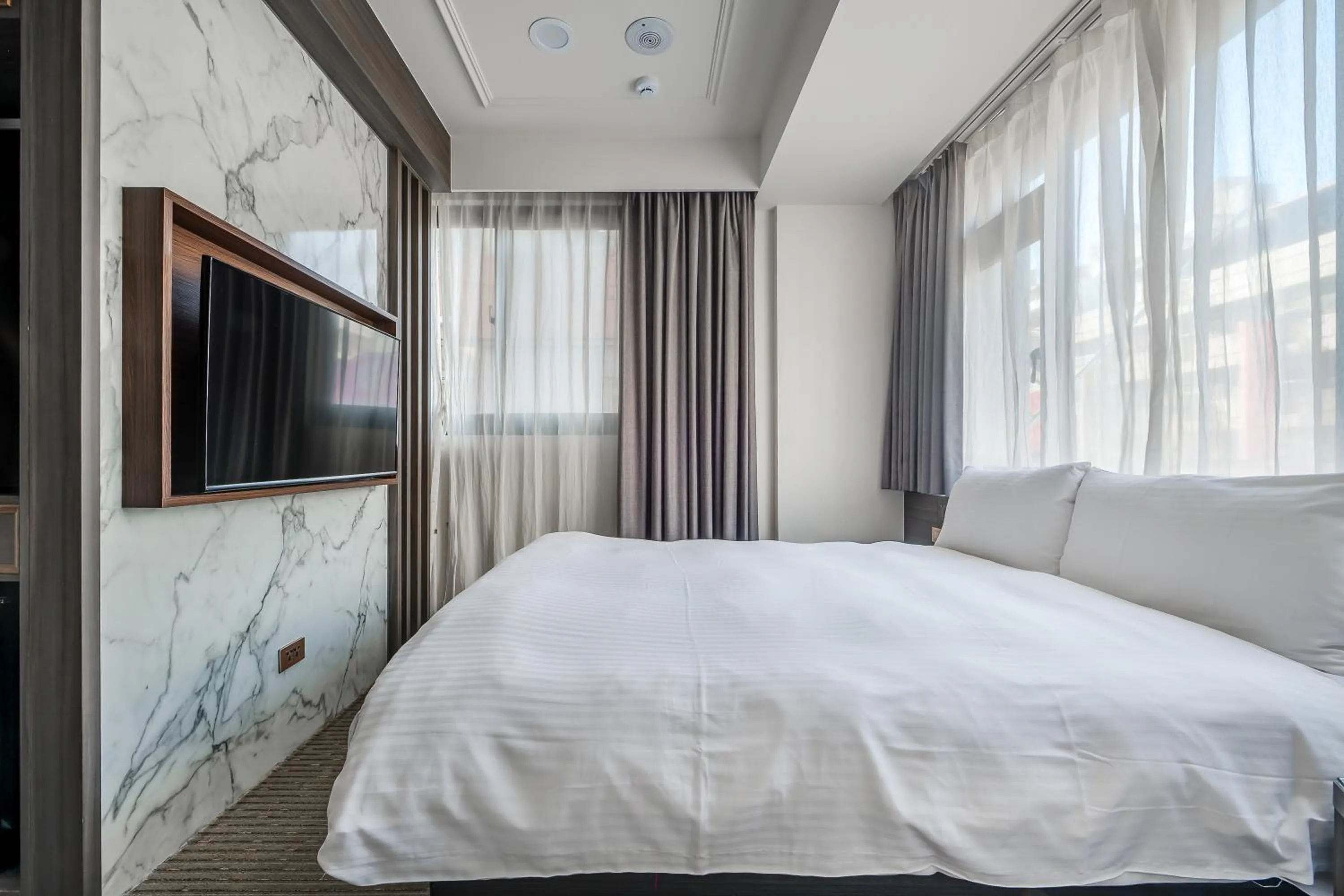 Bed in Dream Mansion Hotel