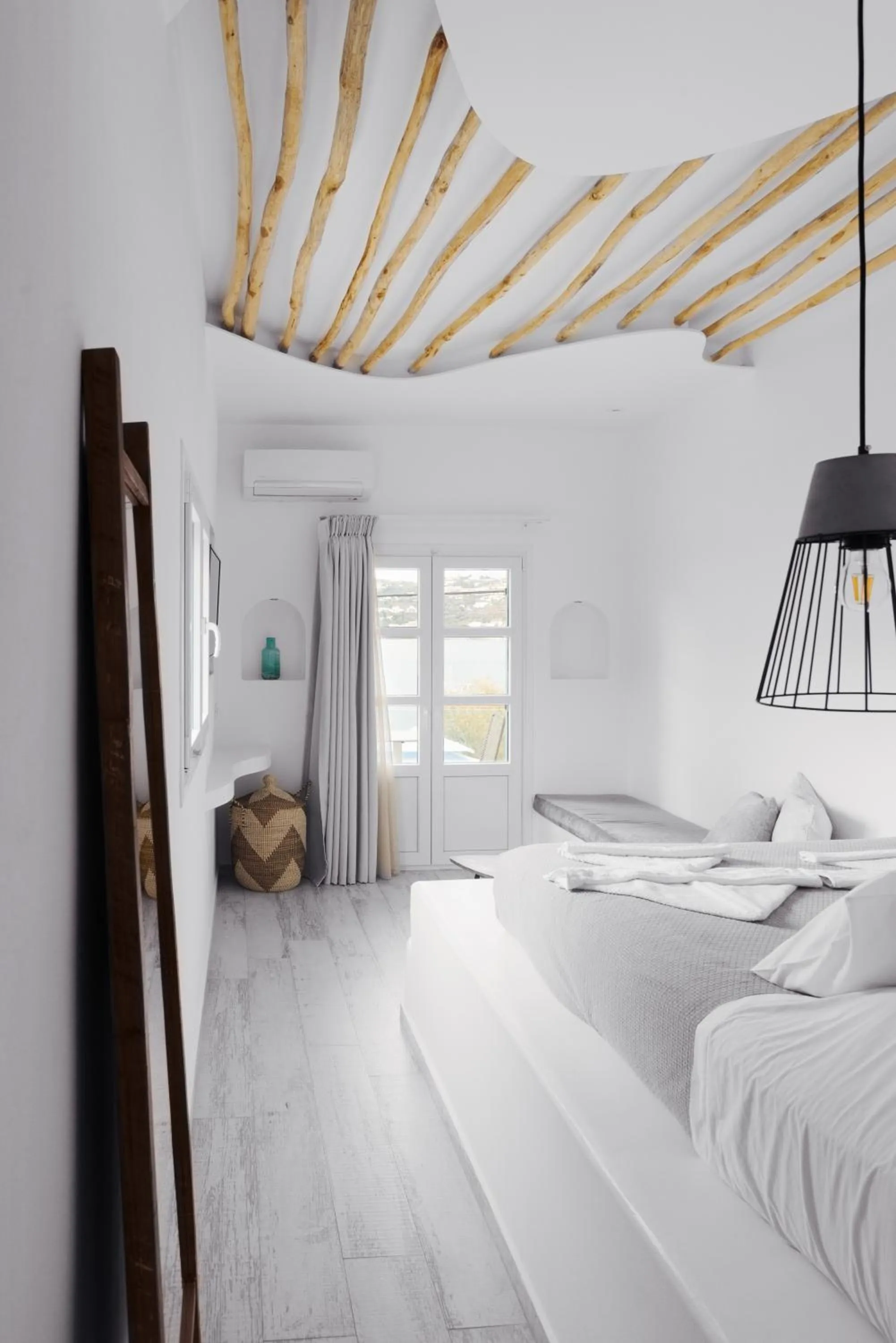 Bed in Alidian bay Suites Leros