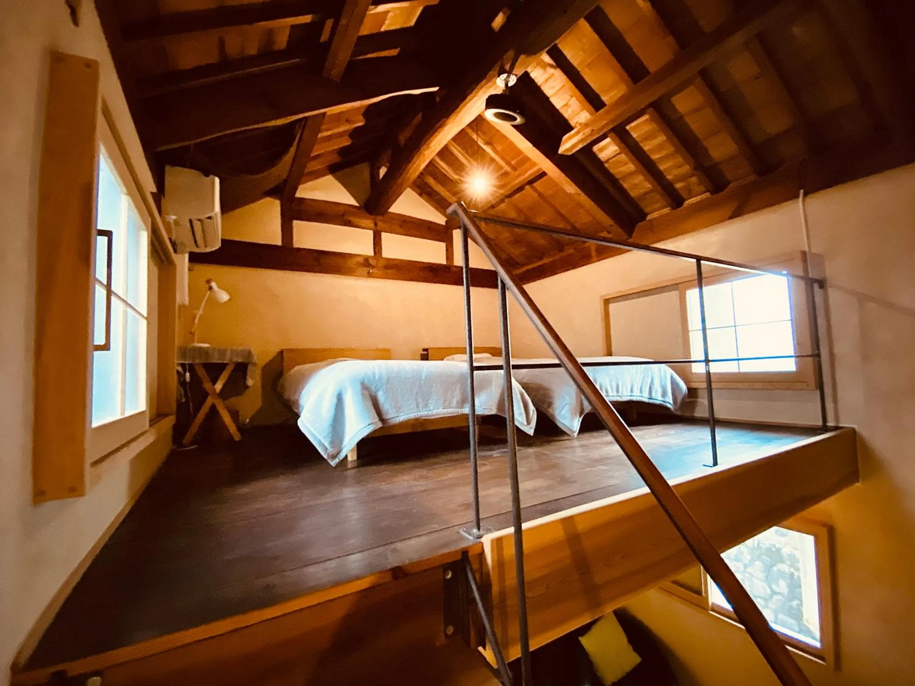 Bed in Yamada Bessou くつろぎの温泉宿 山田別荘