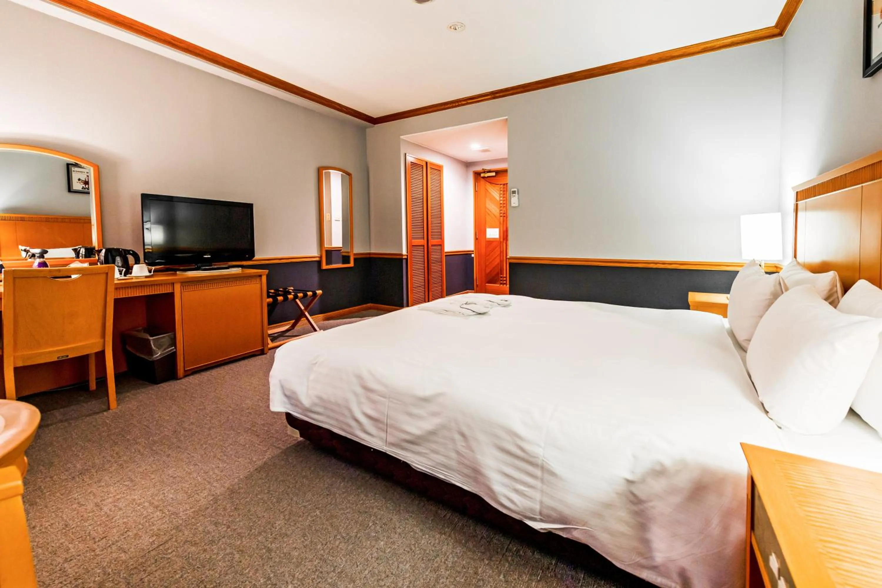 Bed in Hotel Azat Naha