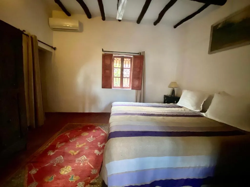 Bed in Relais Esmeralda