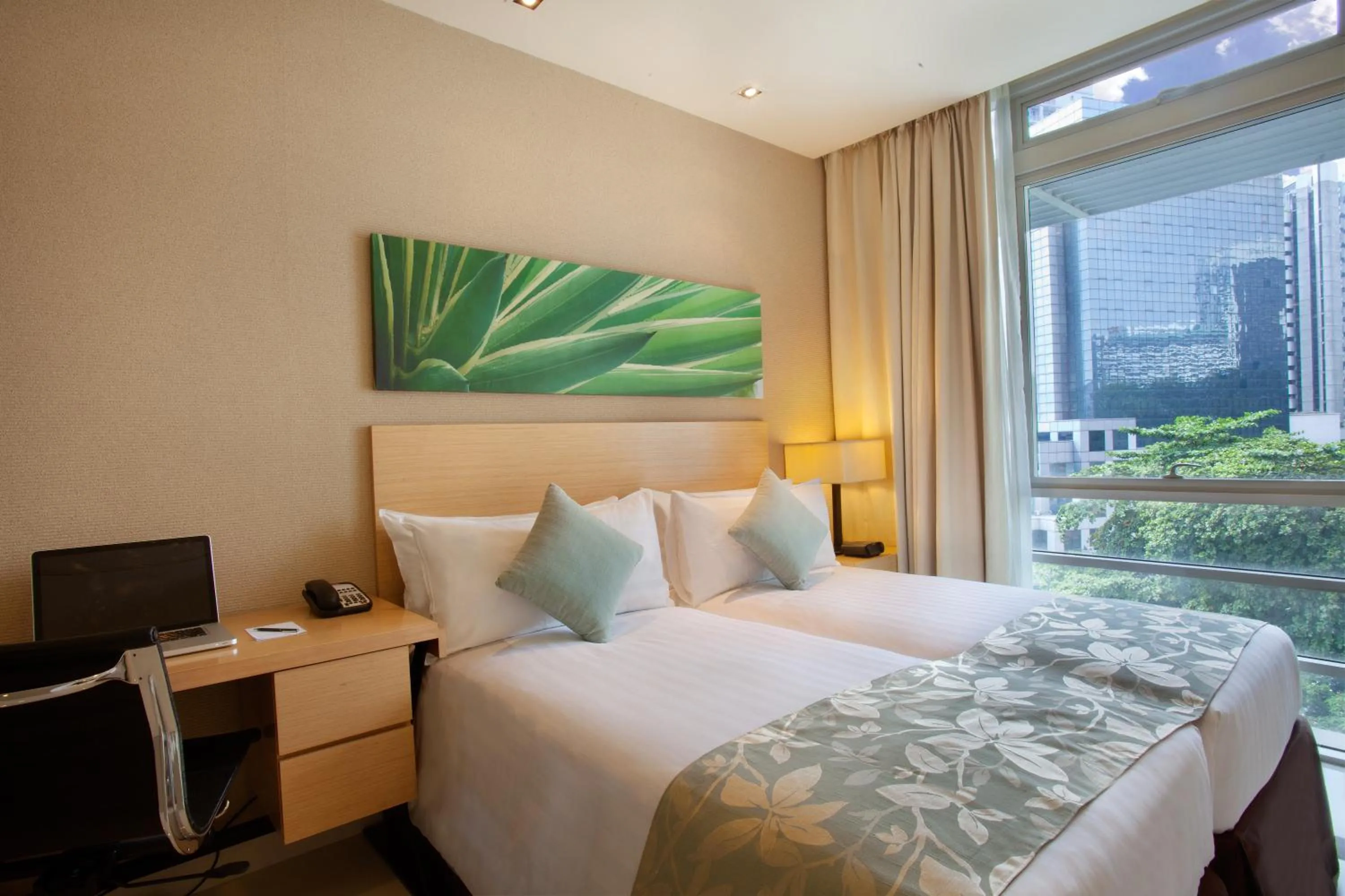 Bed in PARKROYAL Serviced Suites Kuala Lumpur