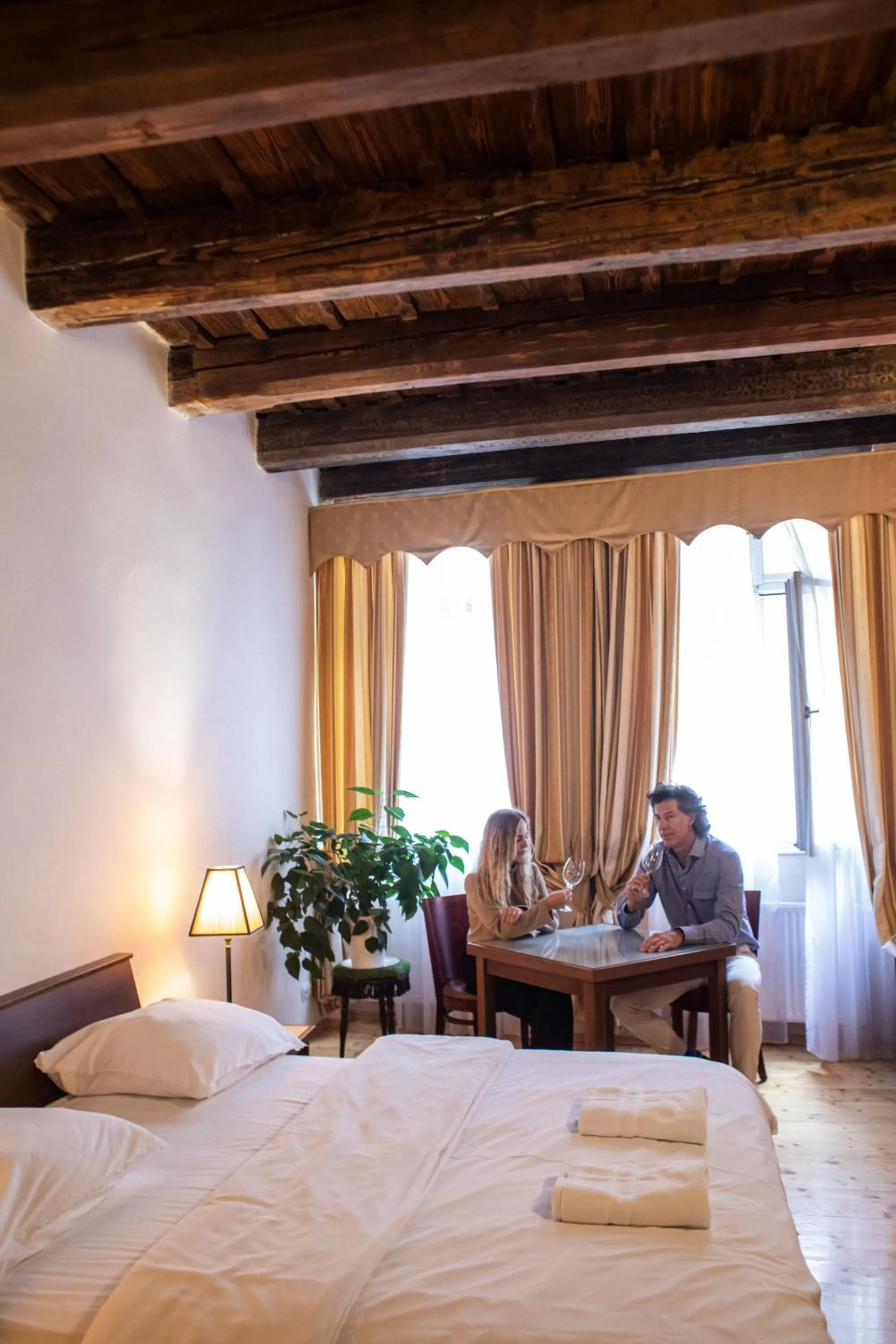 Seating area, Bed in Residence Thunovska