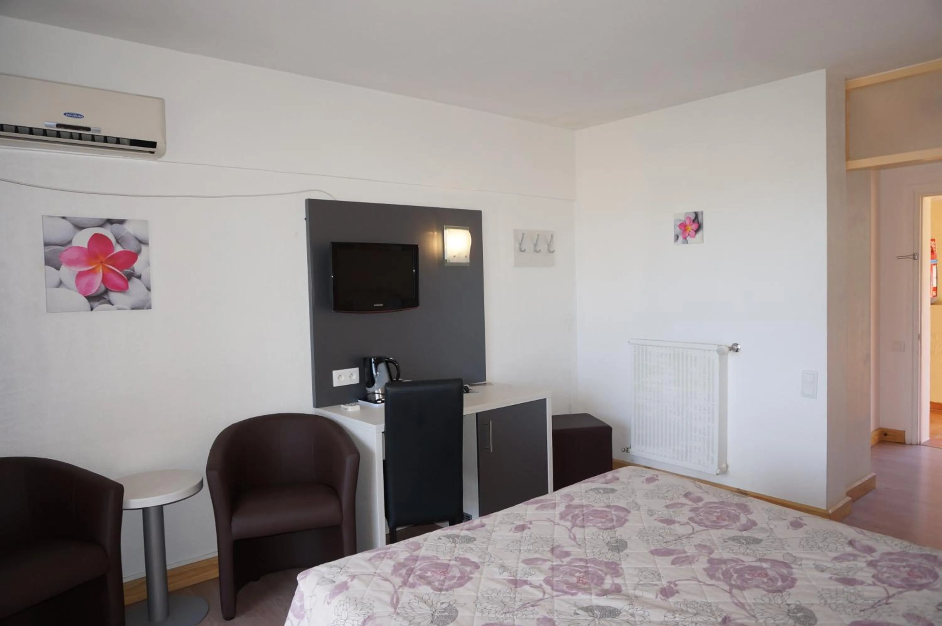 Photo of the whole room, Bed in Logis Hotel Le Col De L'ange