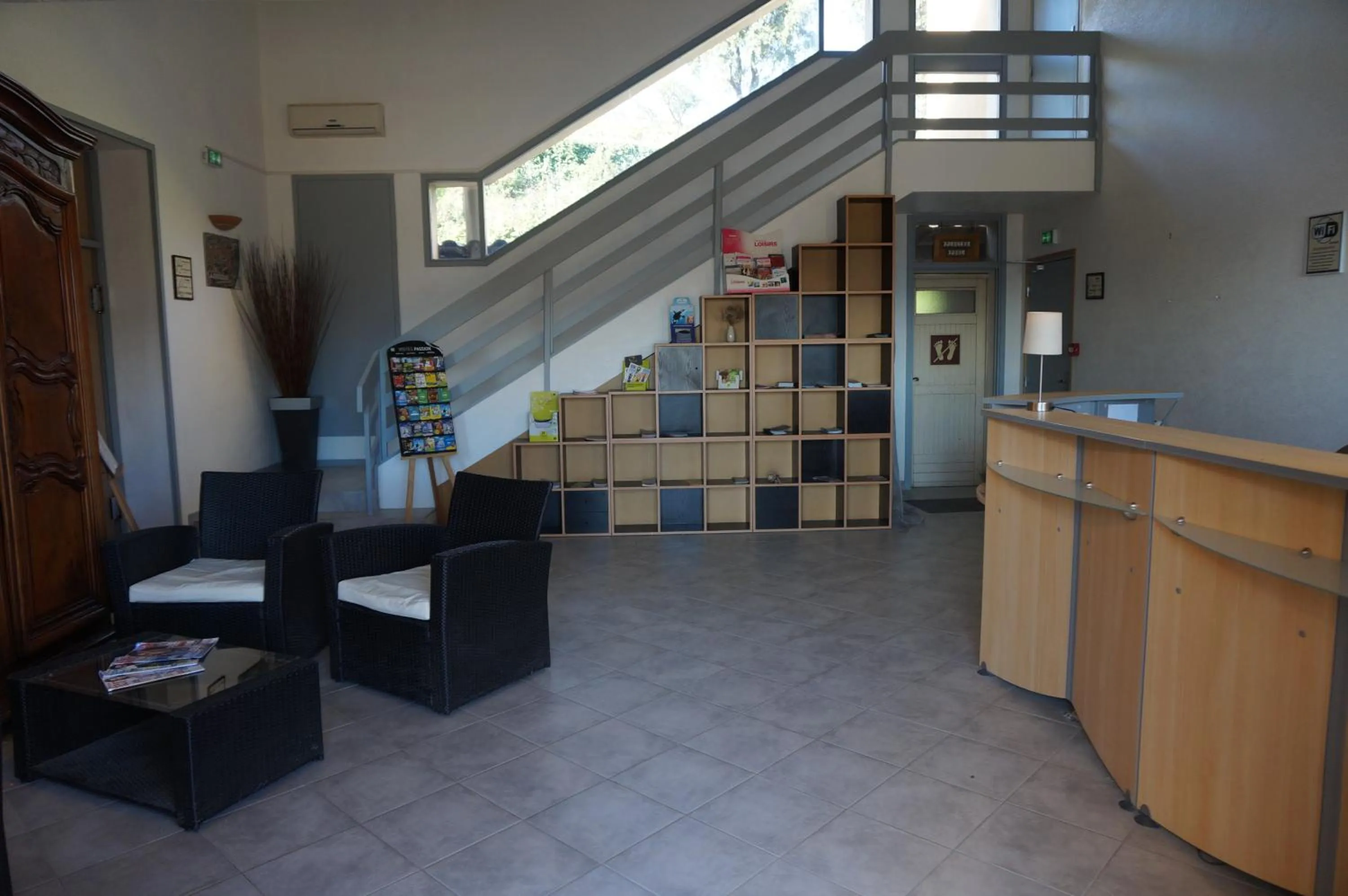 Lobby or reception in Logis Hotel Le Col De L'ange