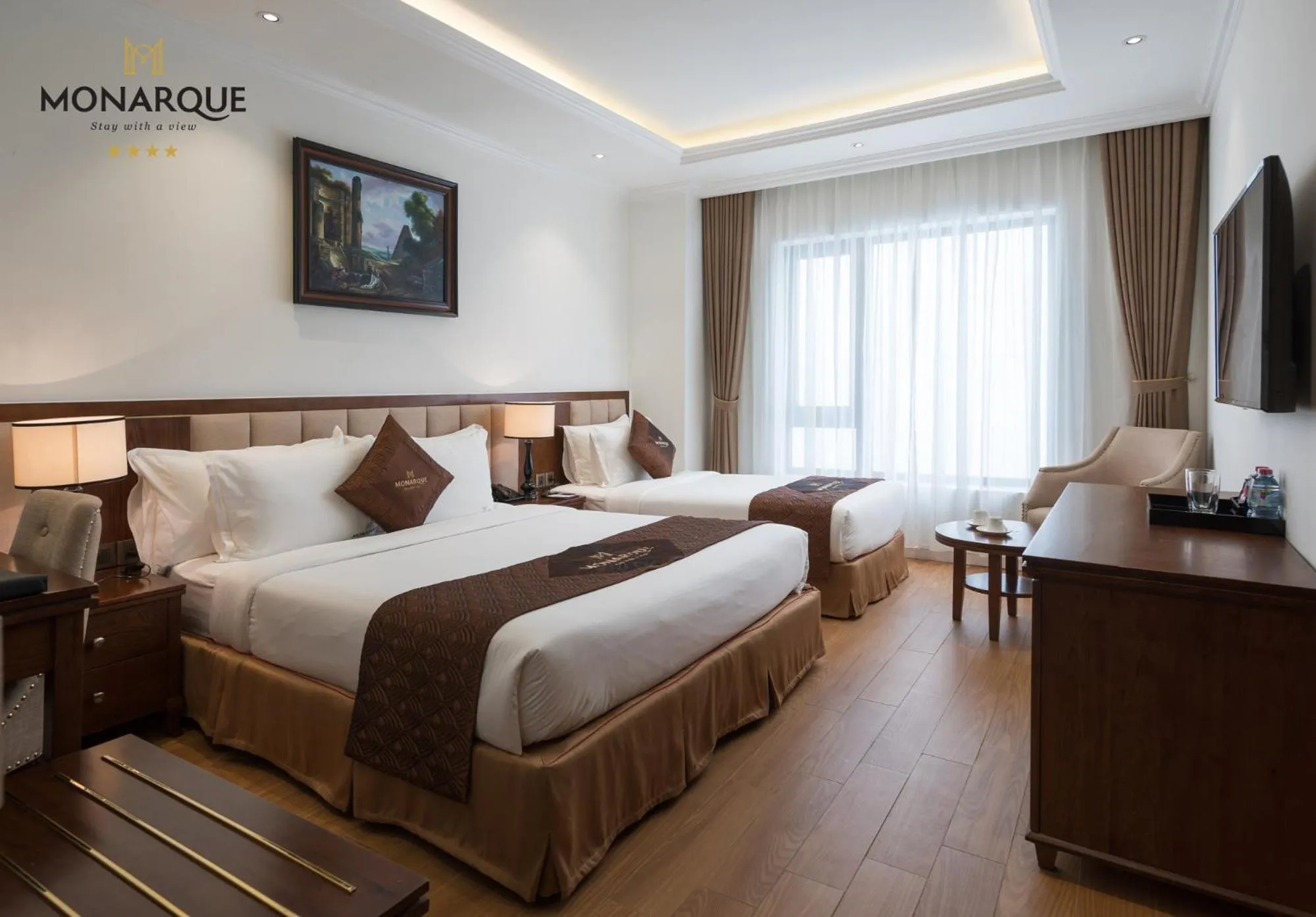 Photo of the whole room, Bed in Monarque Hotel Danang