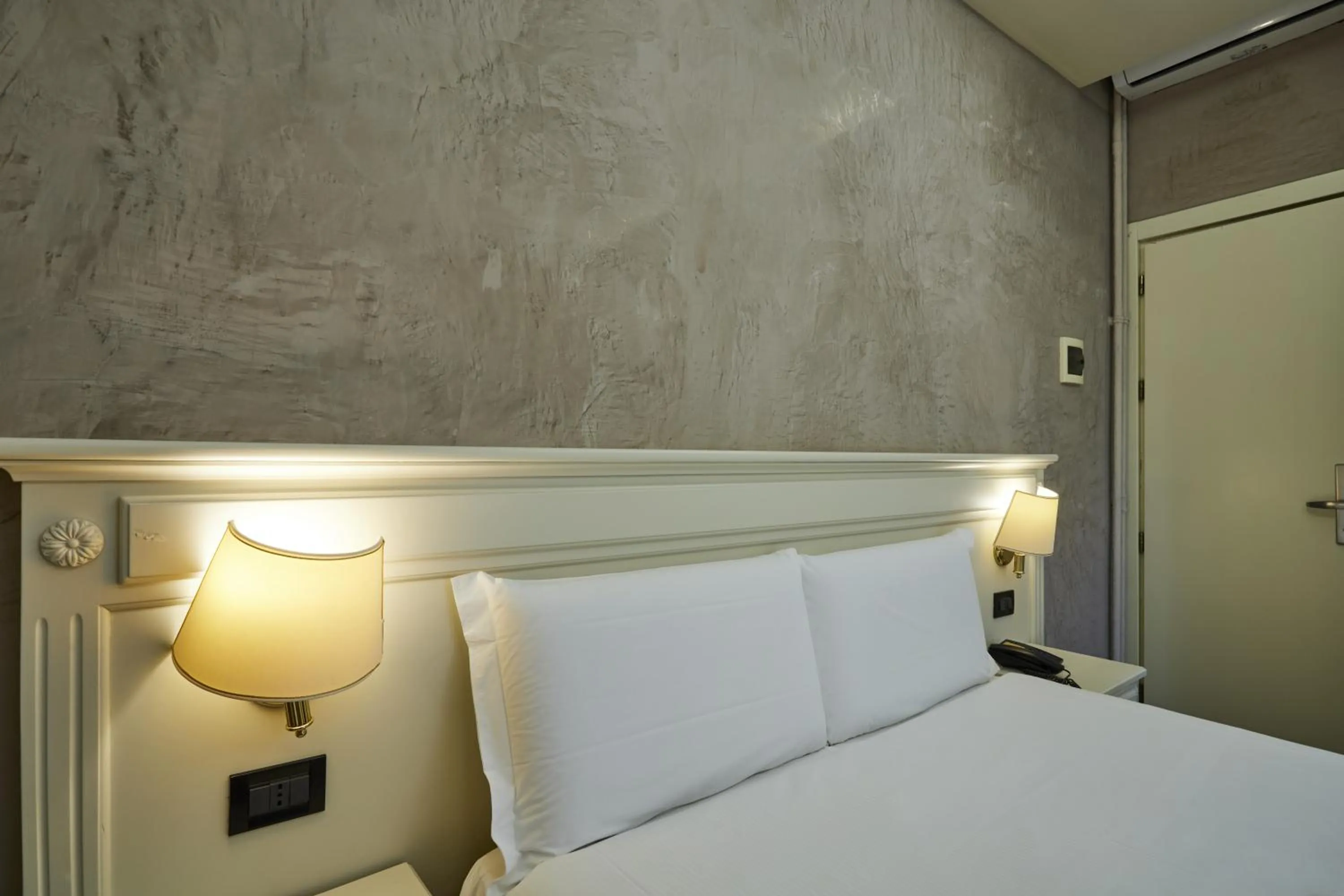 Decorative detail, Bed in Hotel Galimberti