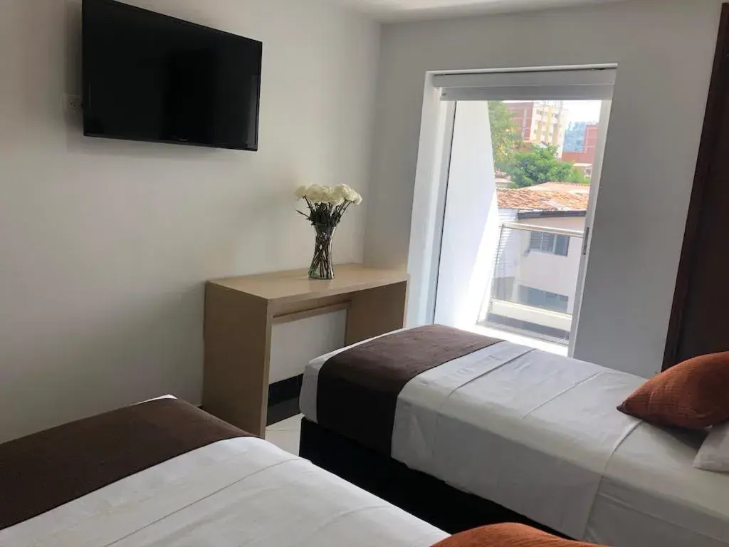 Standard Triple Room in Hotel CSI Medellín Standard Triple Room in Hotel CSI Medellín