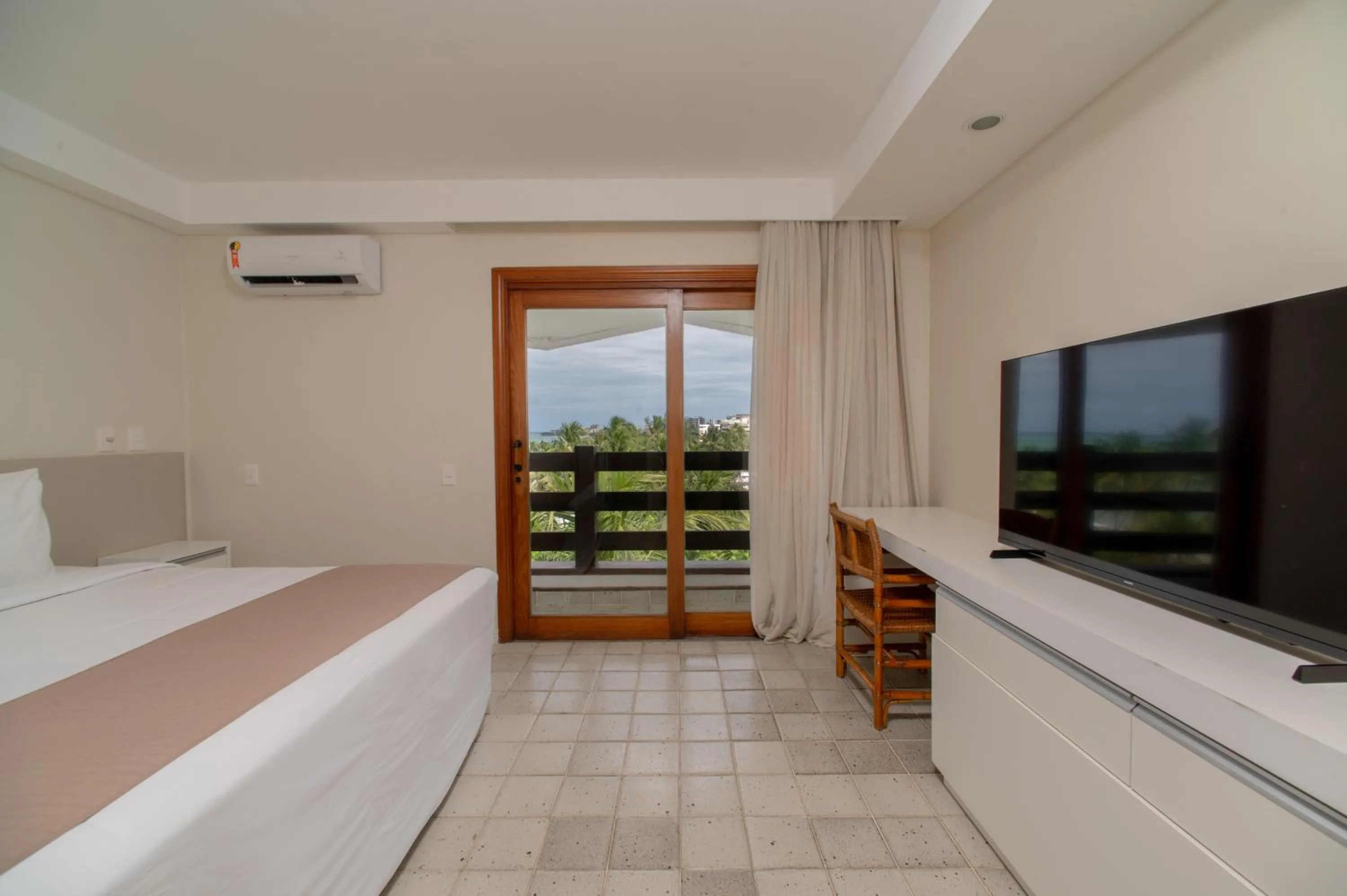 TV and multimedia, Bed in Jatiúca Suites Resort by Slaviero Hotéis