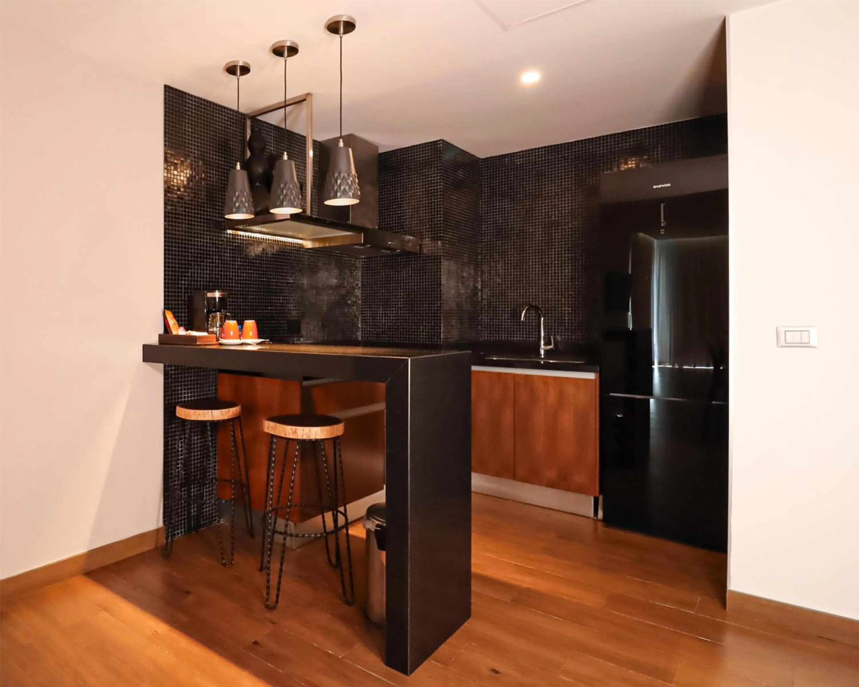 Kitchen or kitchenette in The Fives Downtown Hotel & Residences, Curio Collection by Hilton