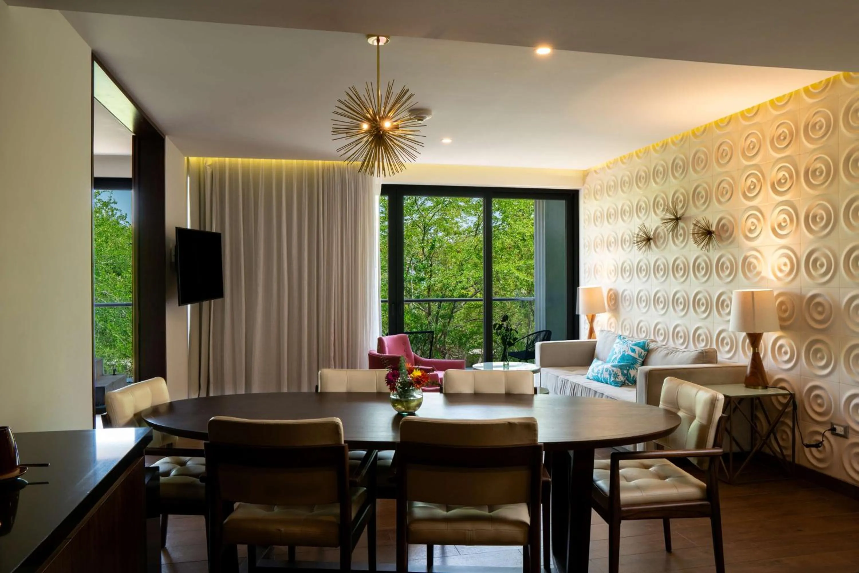 Living room in The Fives Downtown Hotel & Residences, Curio Collection by Hilton