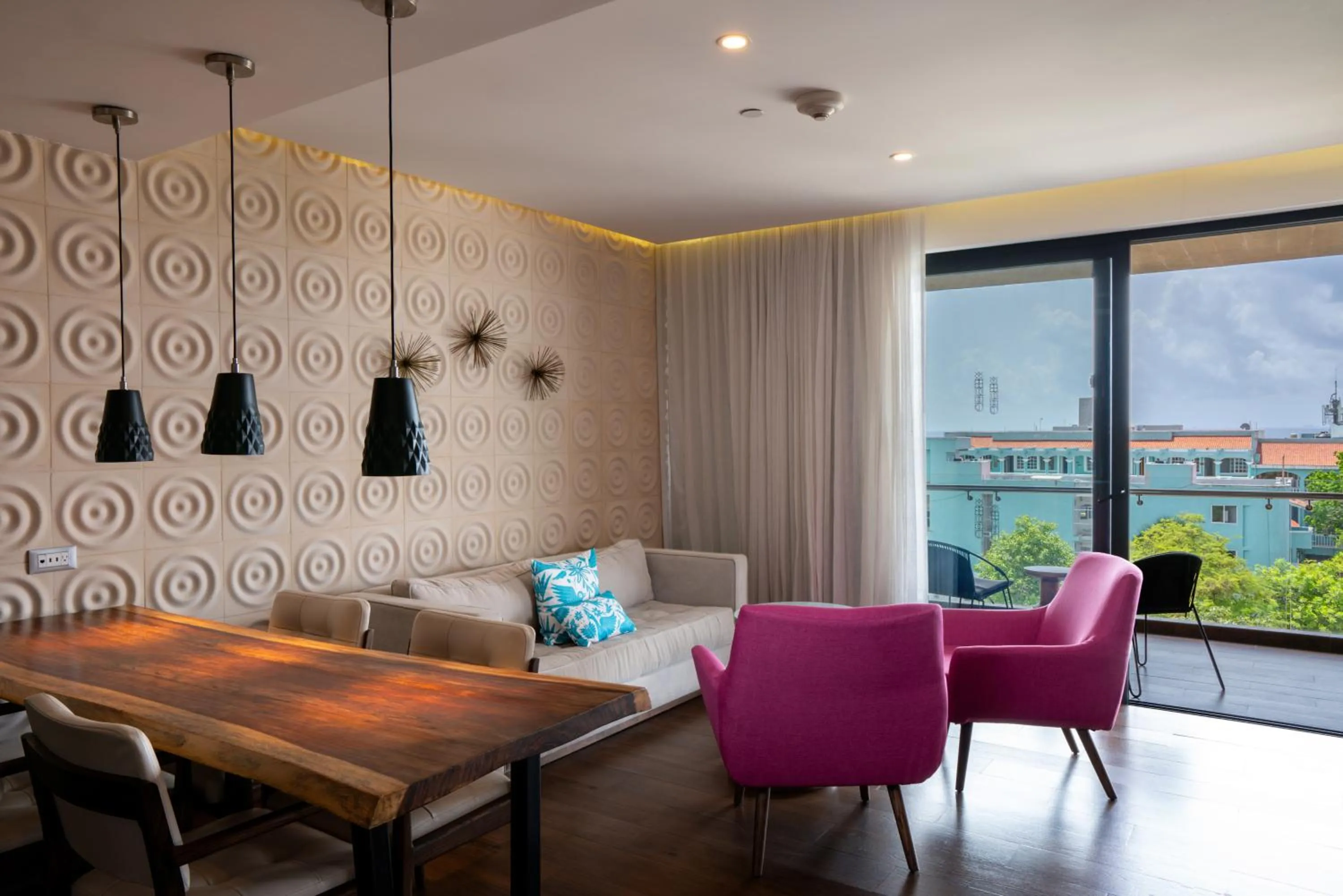 Living room in The Fives Downtown Hotel & Residences, Curio Collection by Hilton