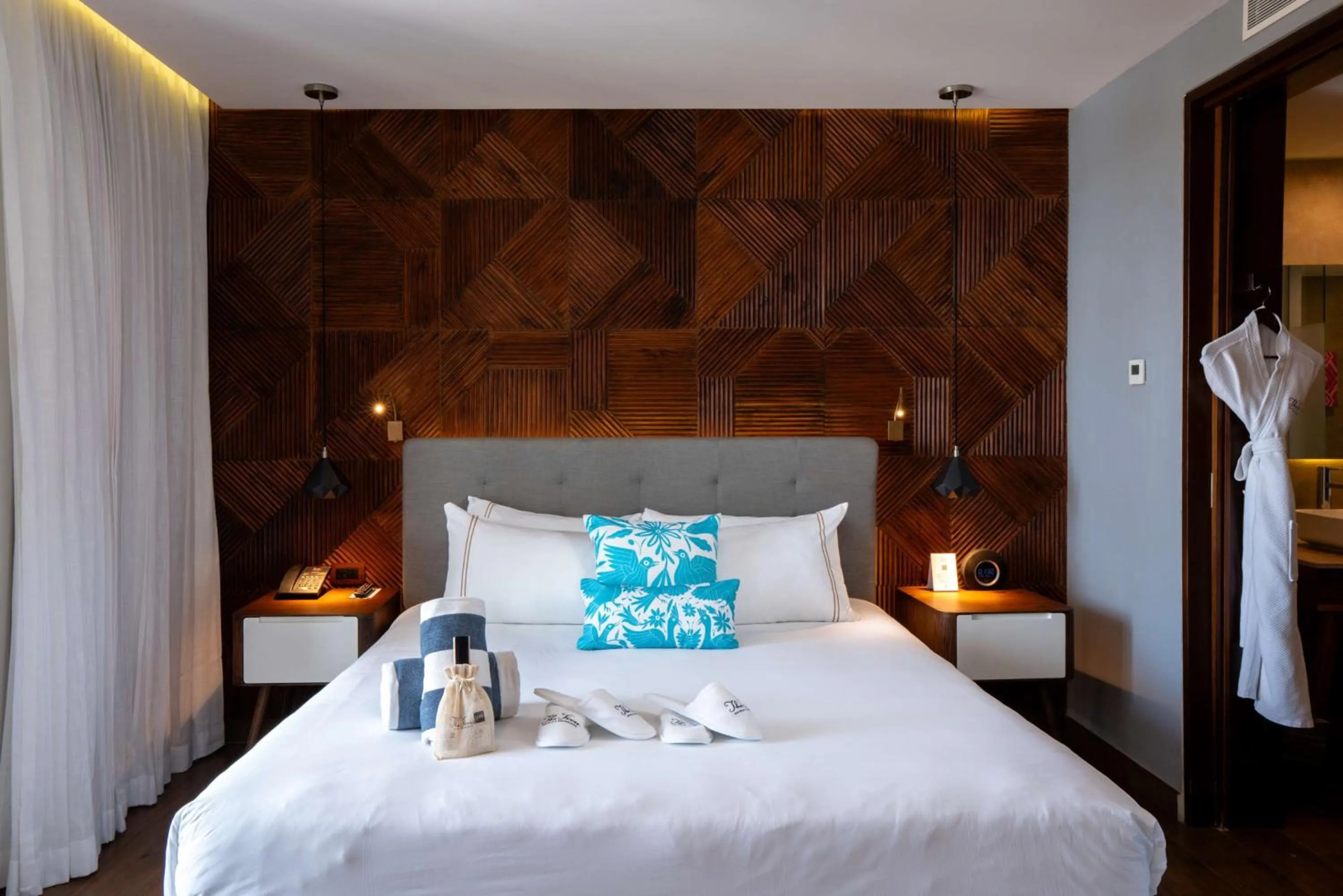 Bed in The Fives Downtown Hotel & Residences, Curio Collection by Hilton