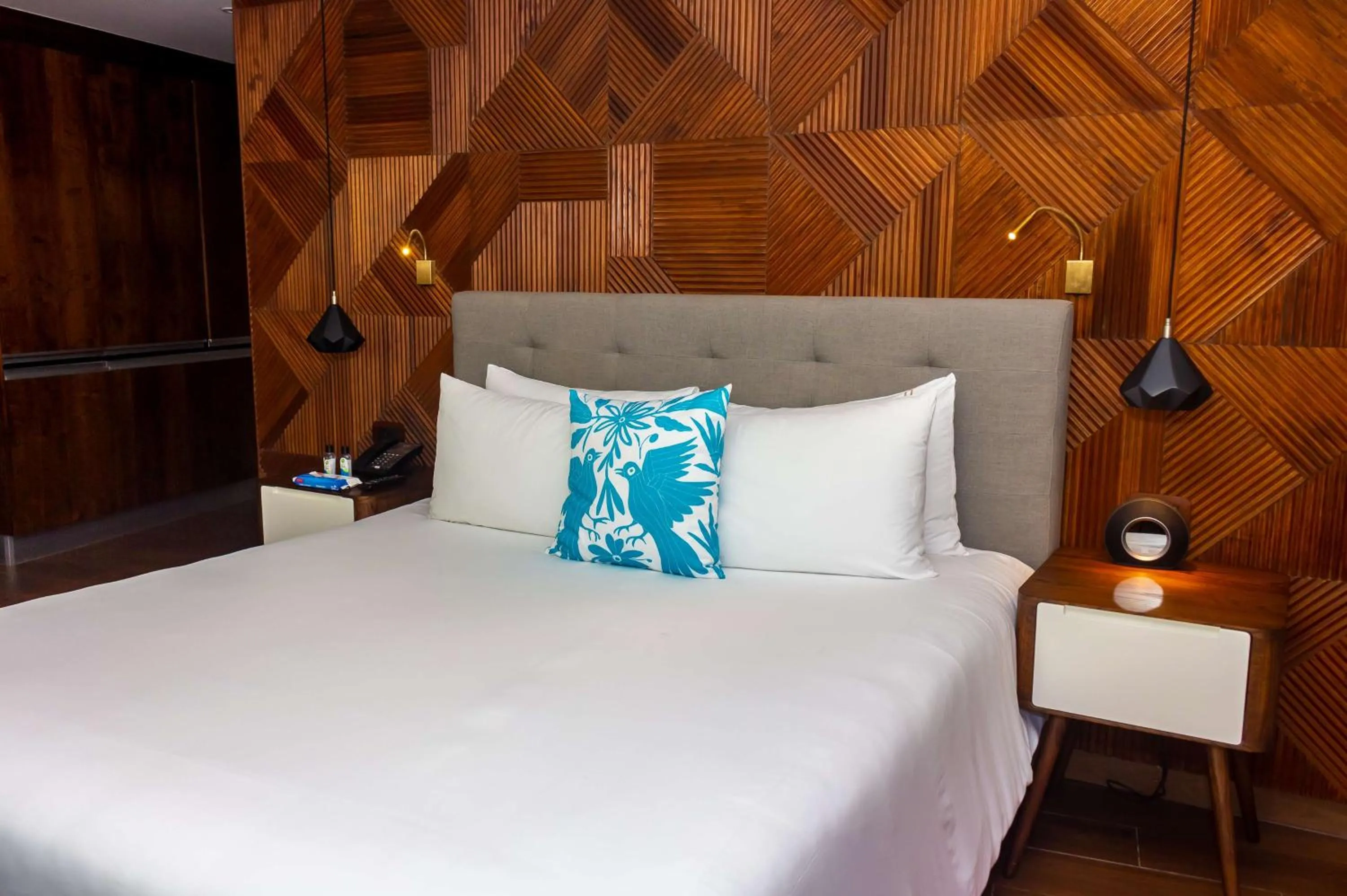 Bed in The Fives Downtown Hotel & Residences, Curio Collection by Hilton