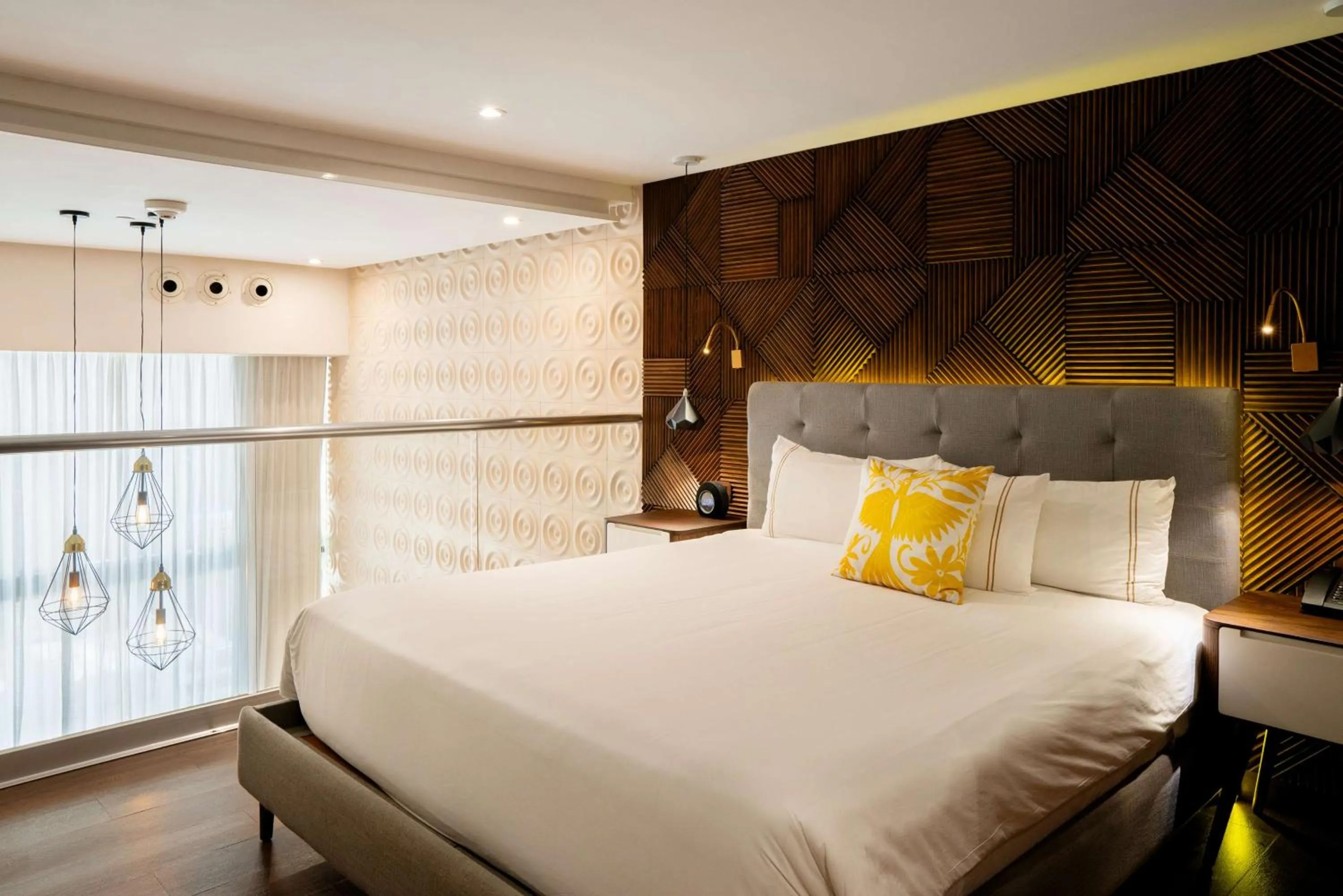 Bed in The Fives Downtown Hotel & Residences, Curio Collection by Hilton