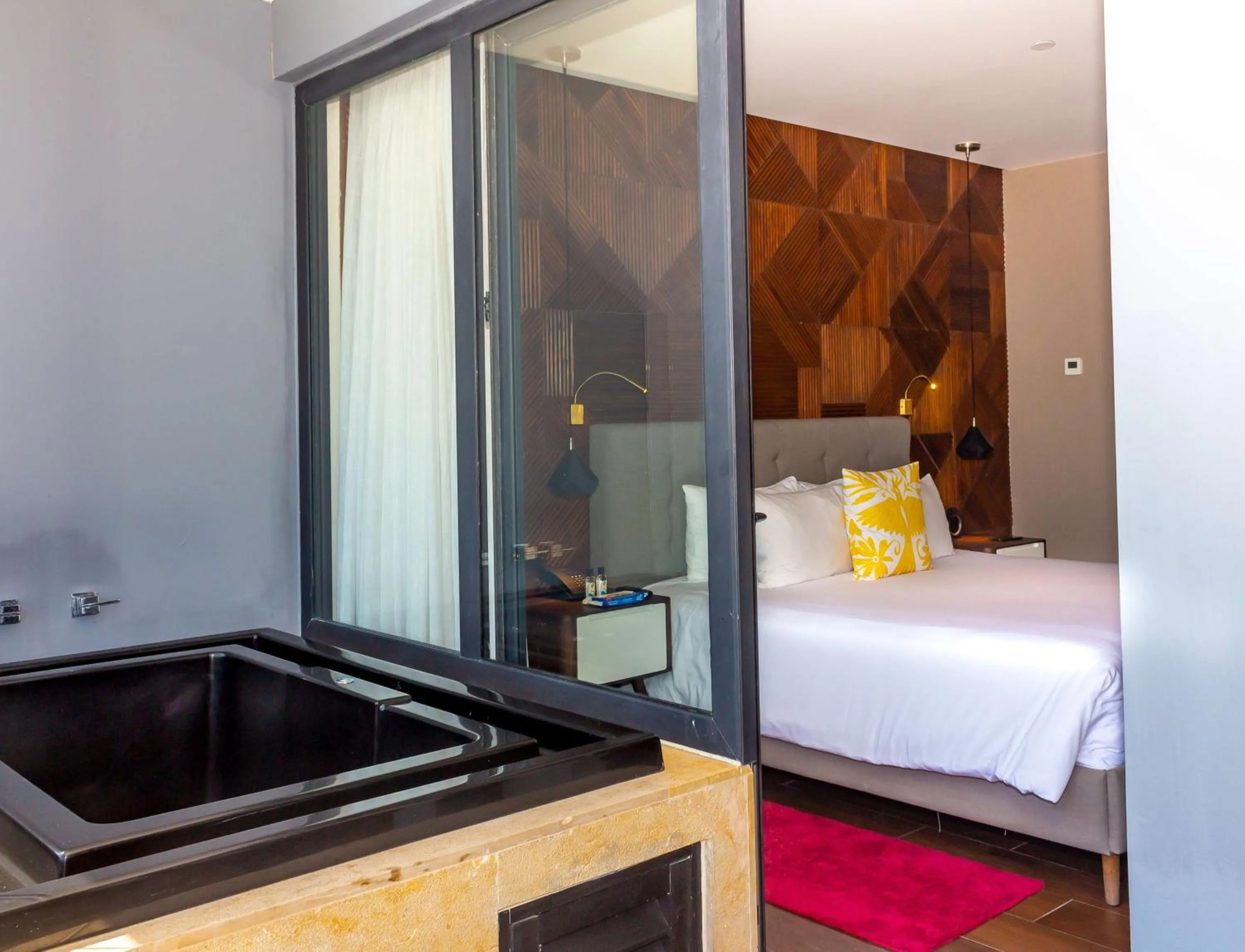 Bed in The Fives Downtown Hotel & Residences, Curio Collection by Hilton