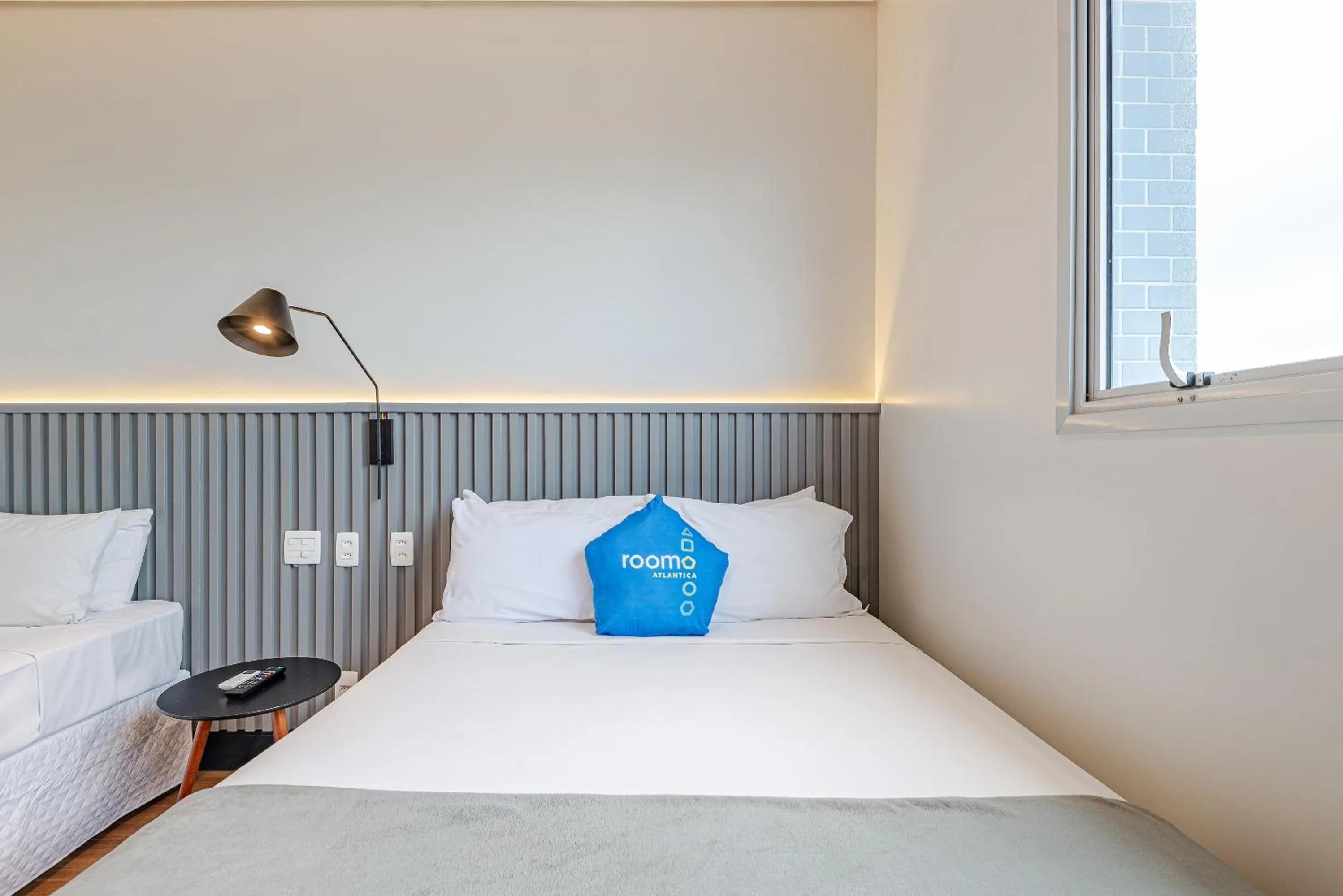 Bed in Roomo Transamerica Santos Gonzaga