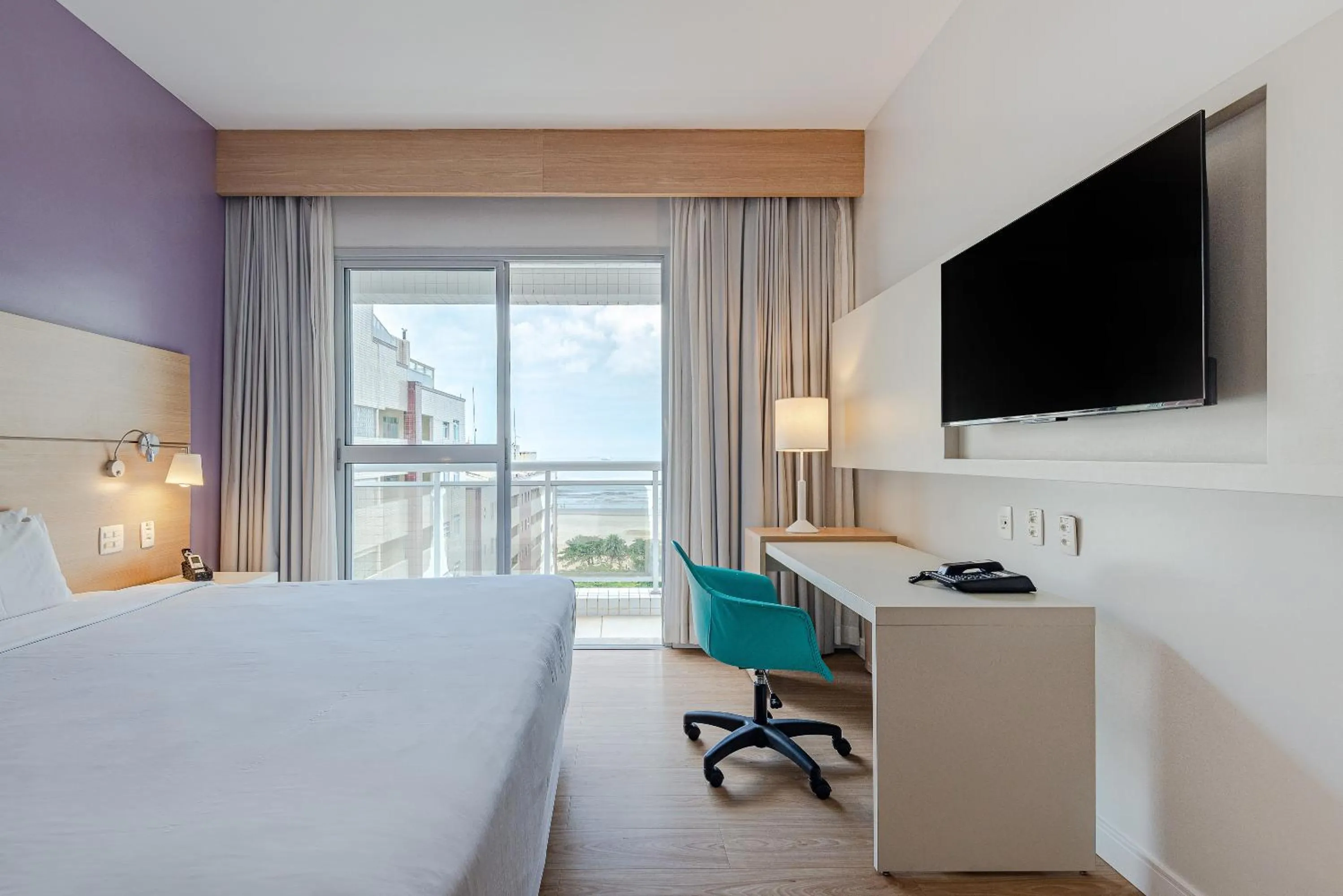 Bed in Roomo Transamerica Santos Gonzaga