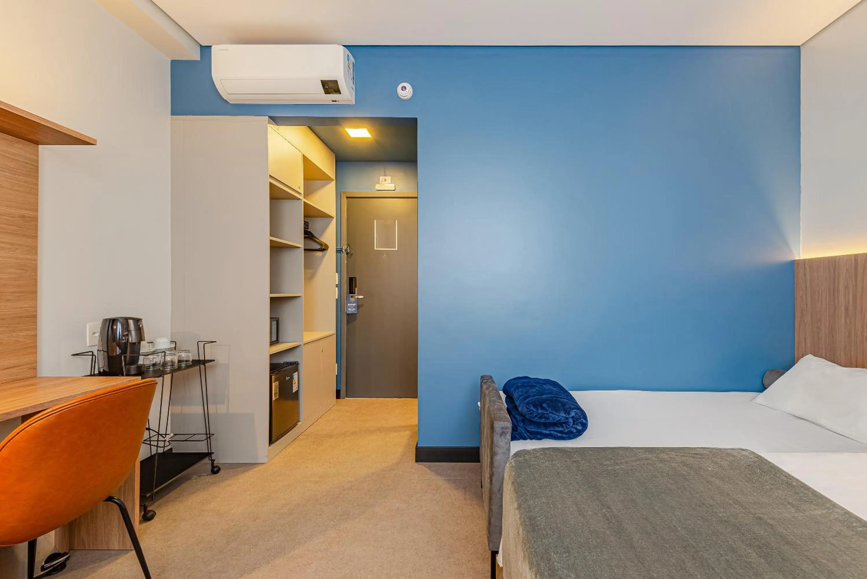 Bed in Roomo Transamerica Santos Gonzaga