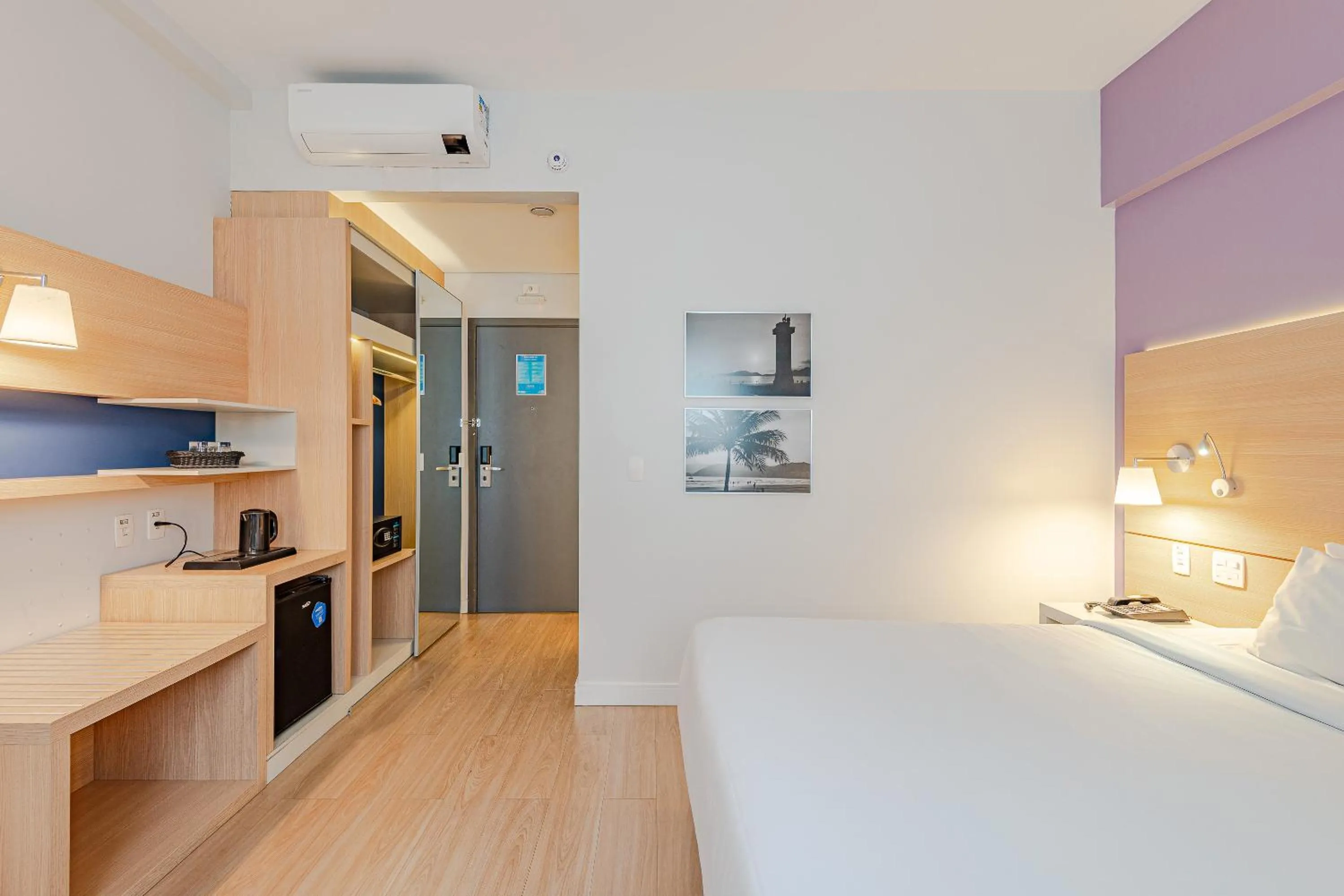 Photo of the whole room, Bed in Roomo Transamerica Santos Gonzaga