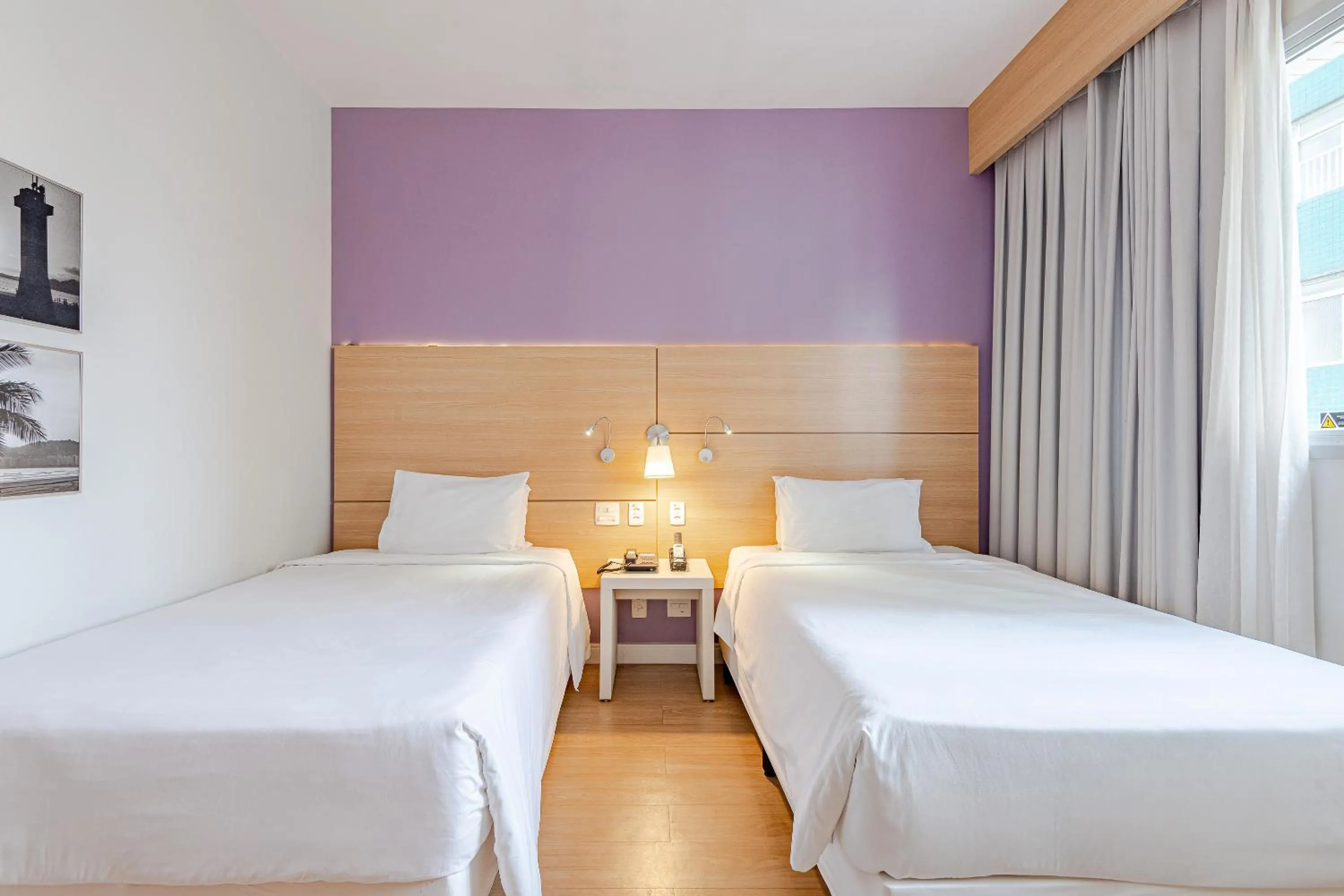 Bed in Roomo Transamerica Santos Gonzaga