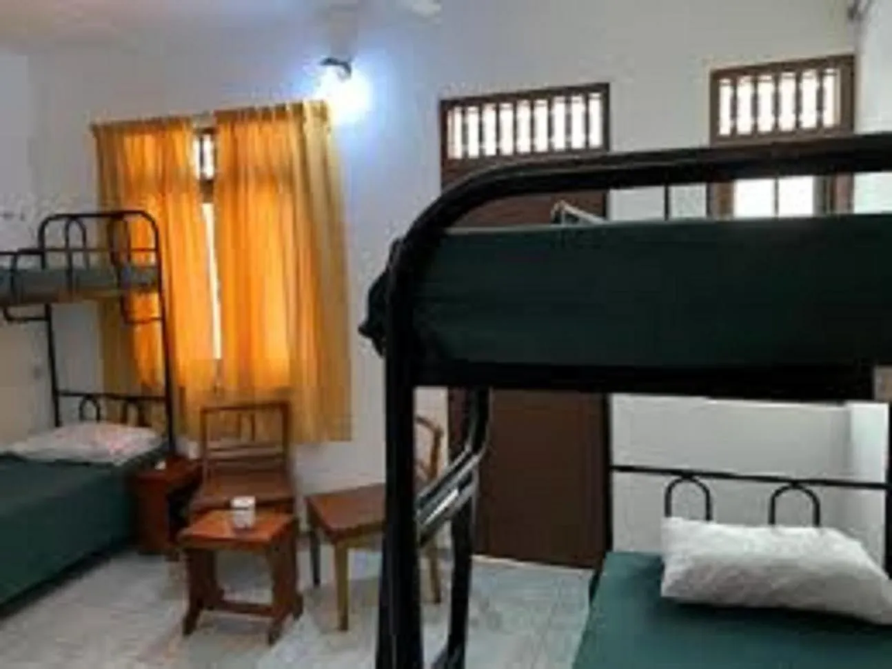 Bed in Topaz Beach Hotel