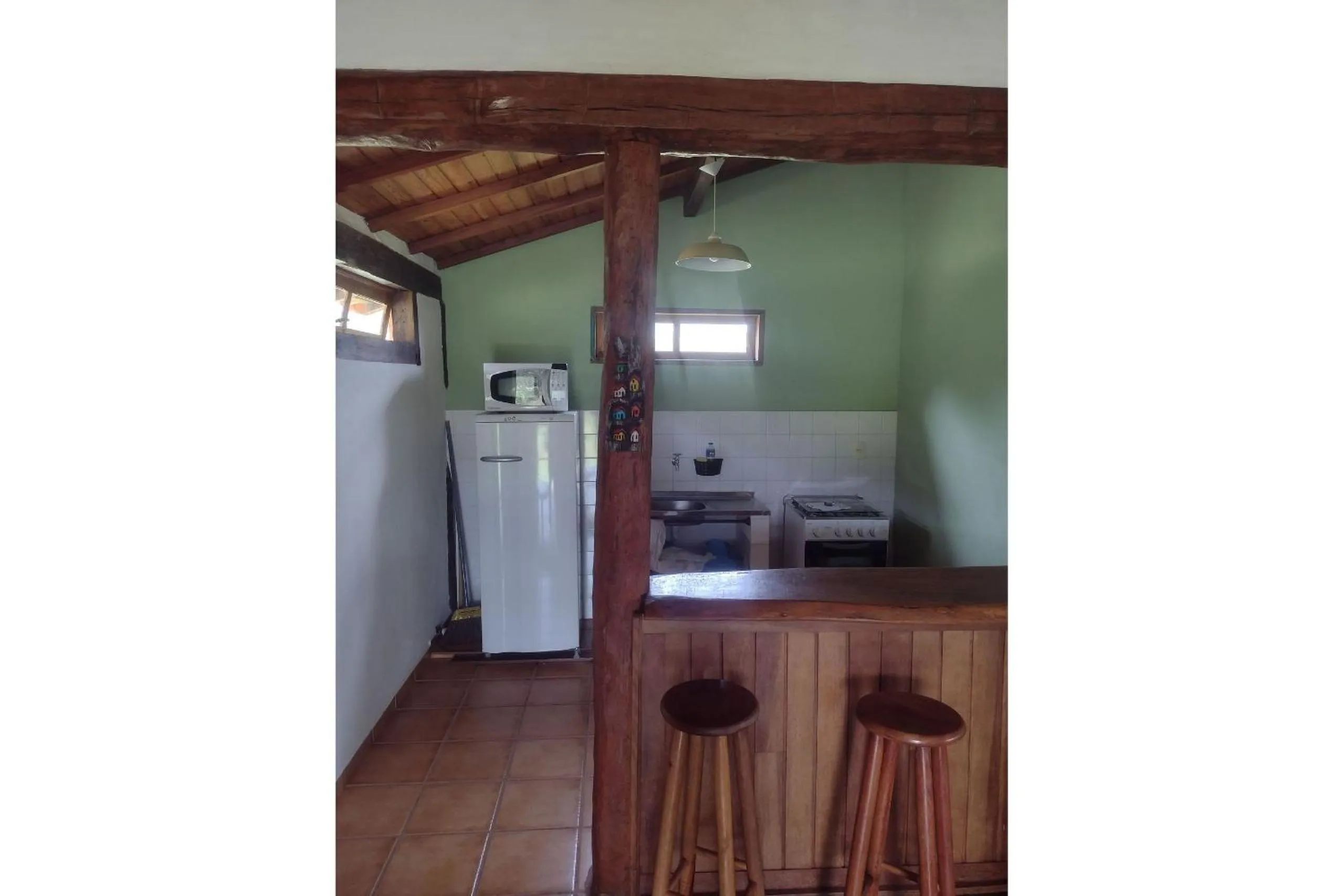 Kitchen or kitchenette in Pousada Chalé Terra Viva