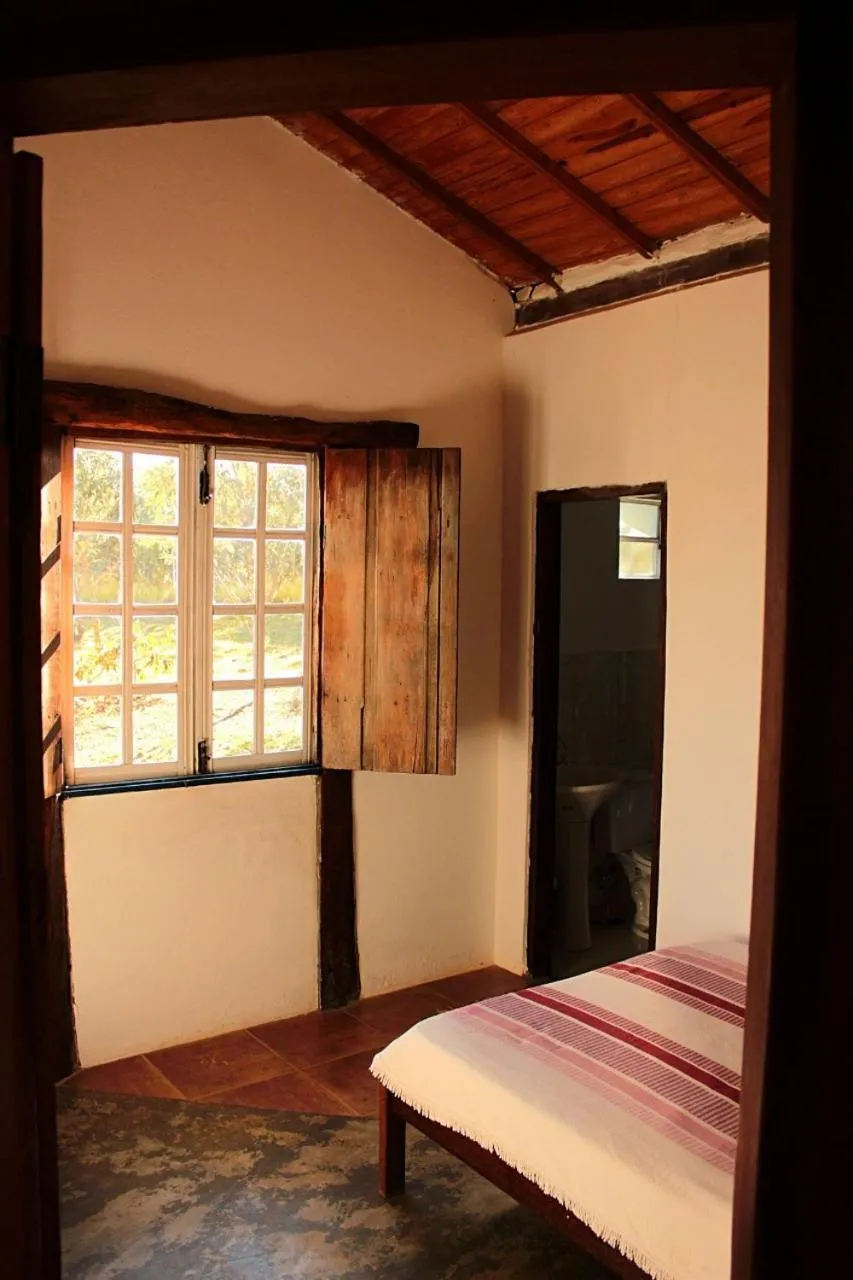 Bed in Pousada Chalé Terra Viva