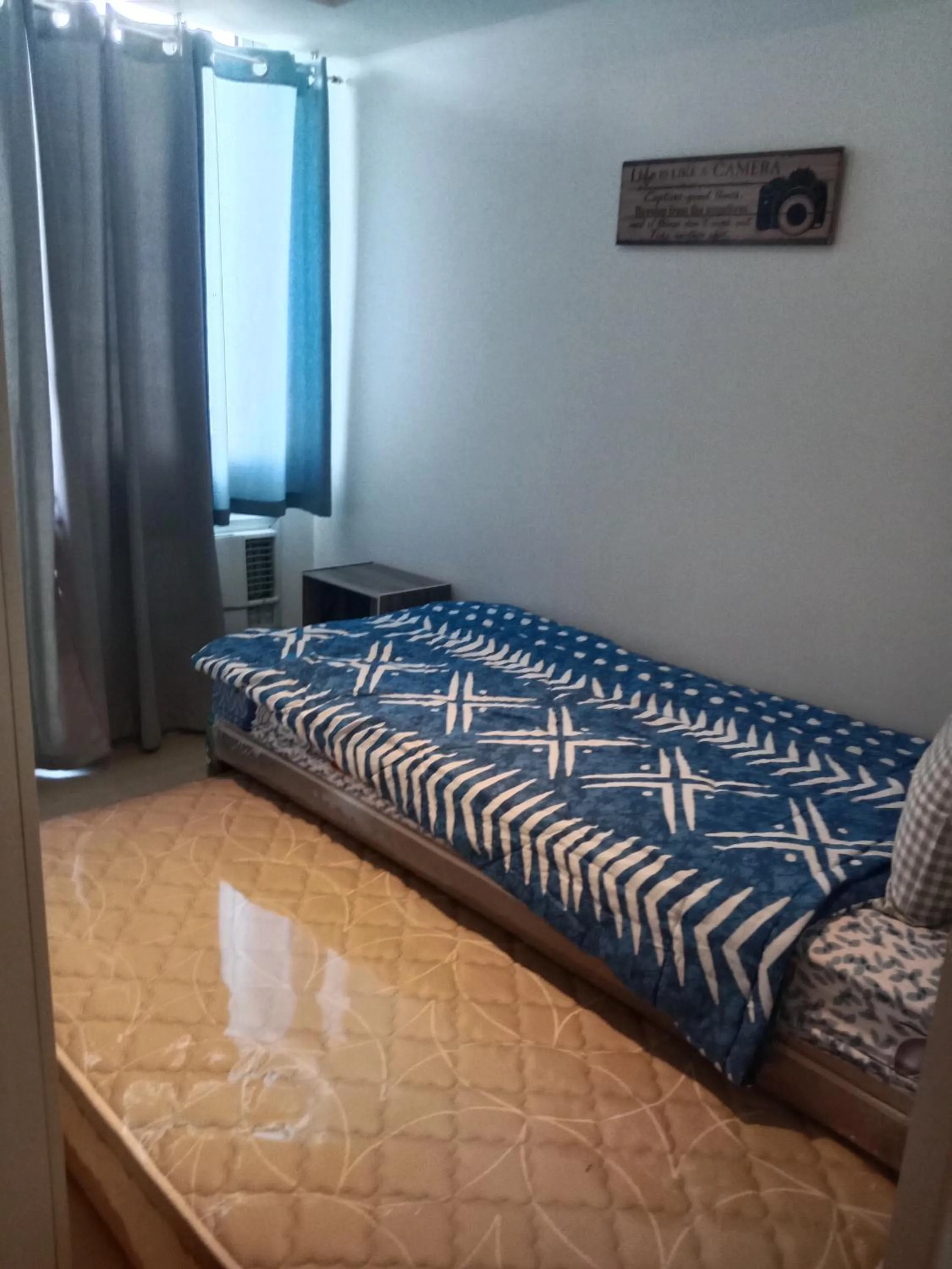 Bed in Azure Residences by Van Florendo
