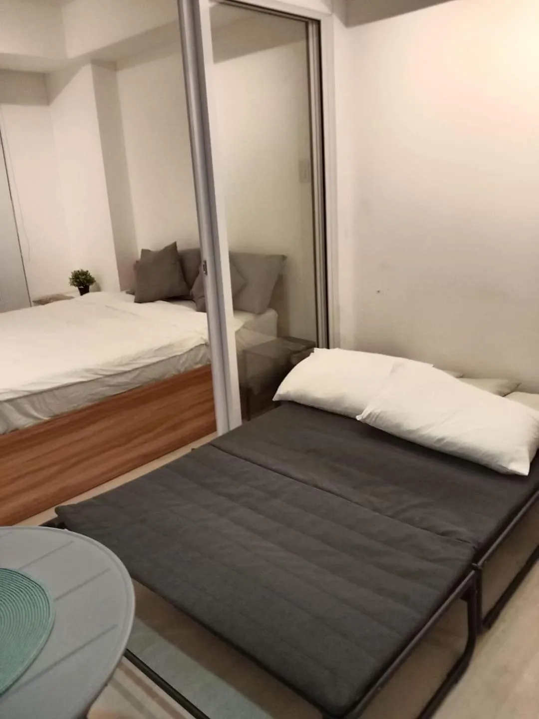 Bed in Azure Residences by Van Florendo