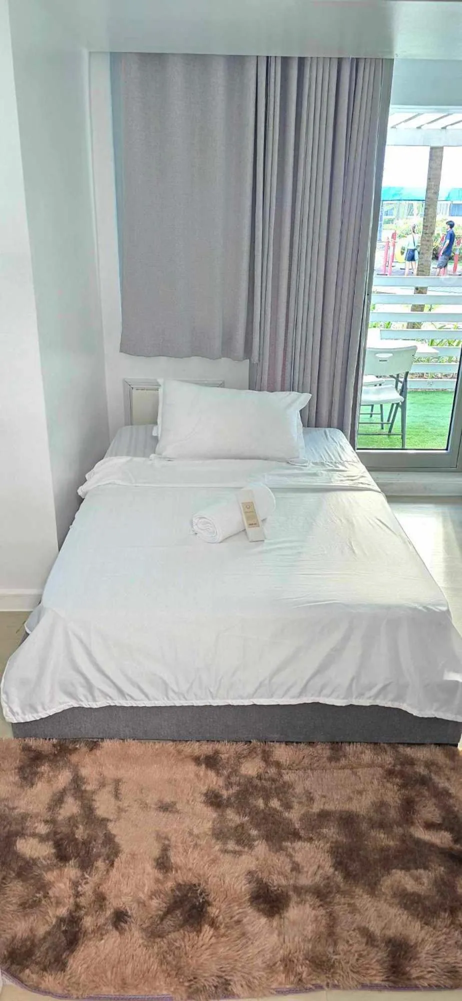 Bed in Azure Residences by Van Florendo