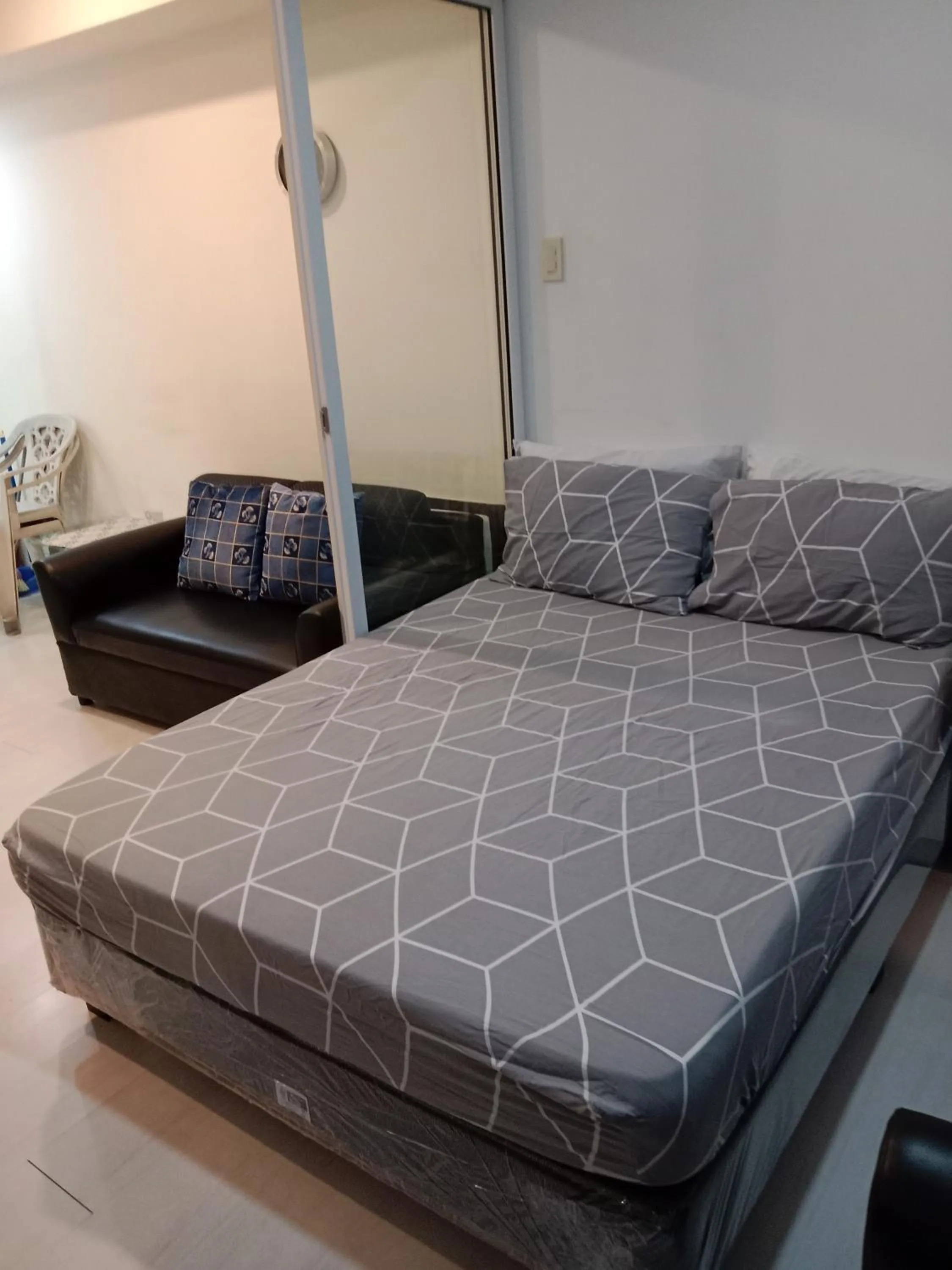 Bed in Azure Residences by Van Florendo