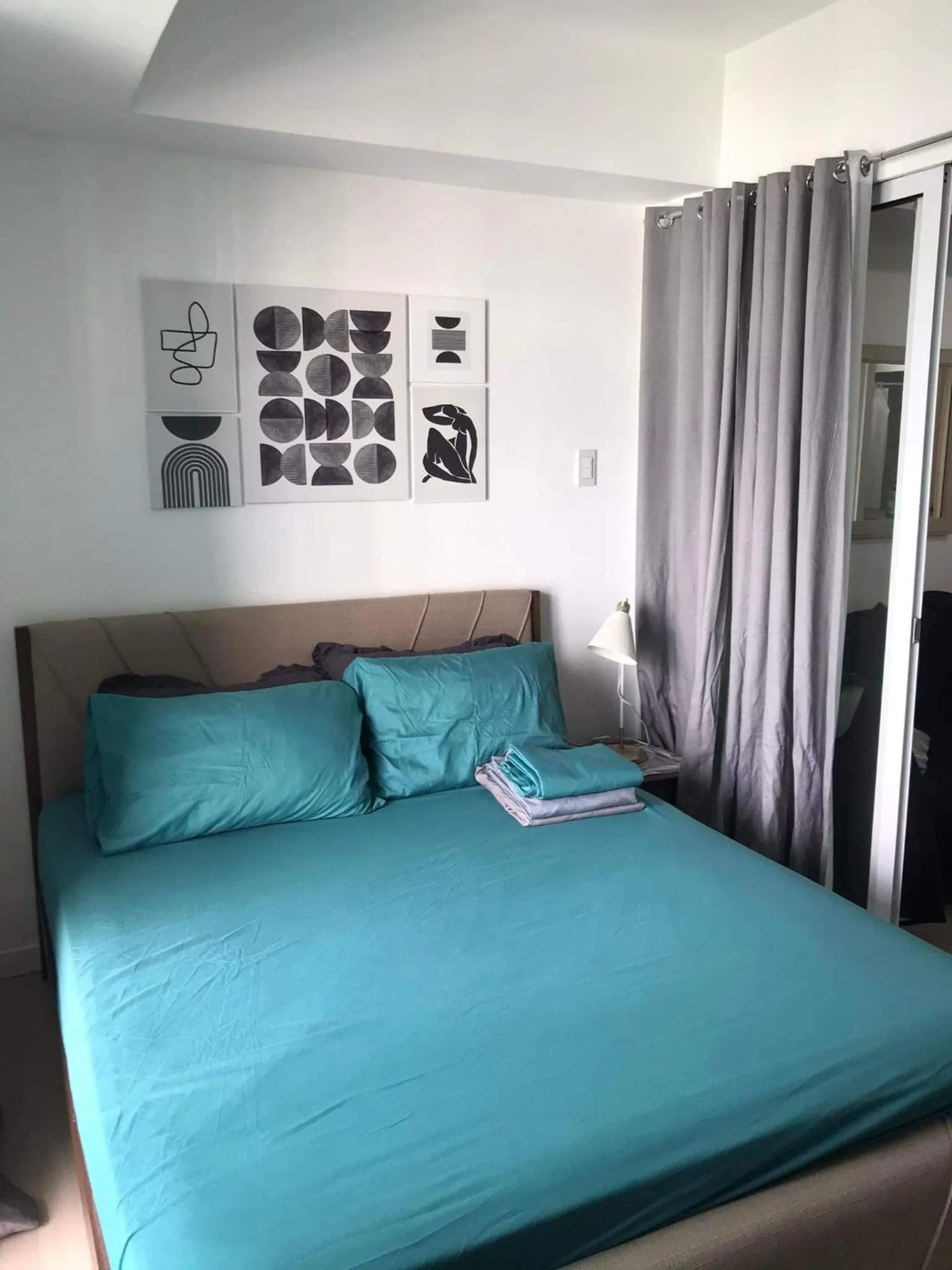 Bed in Azure Residences by Van Florendo