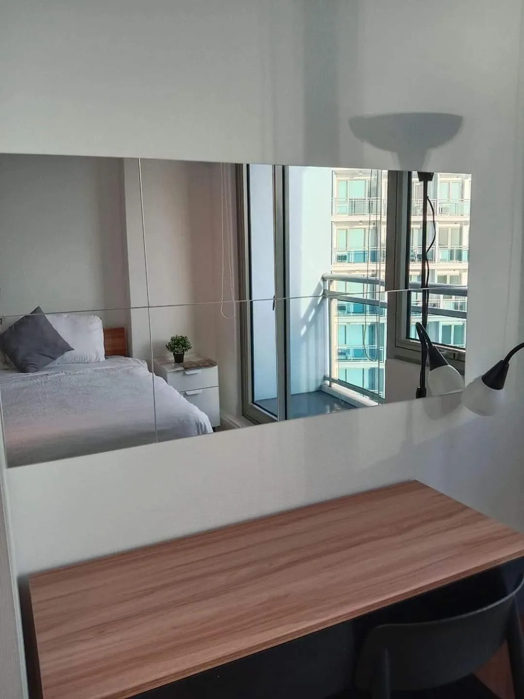 Bed in Azure Residences by Van Florendo