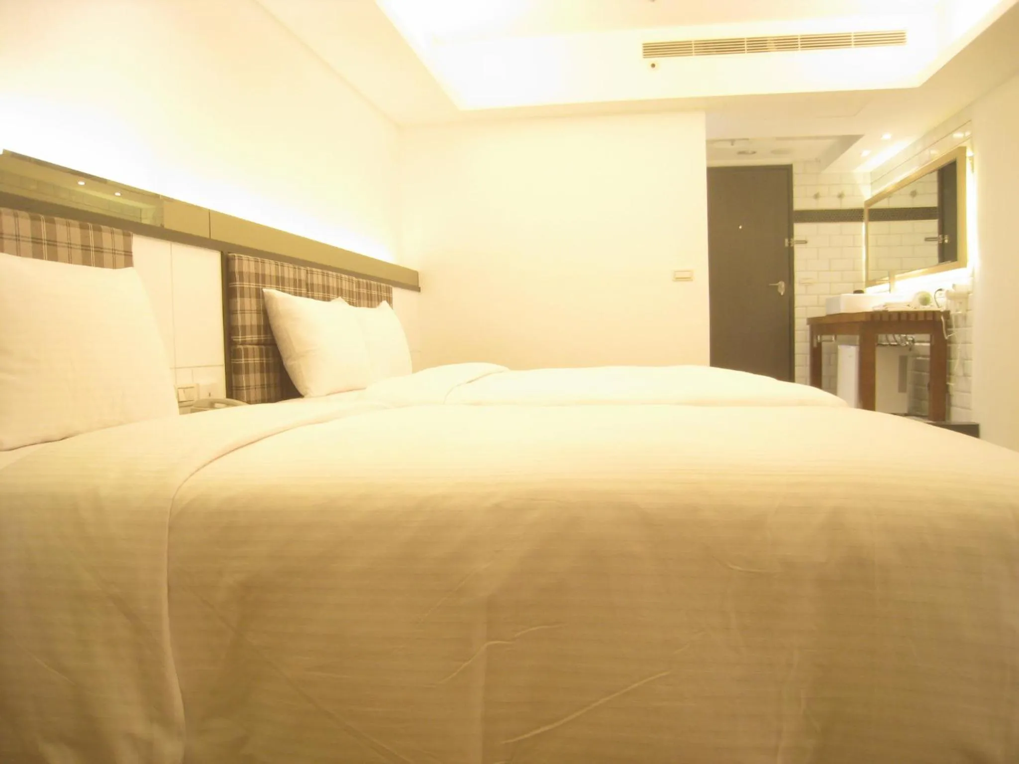 Bed in Formosa Boulerard Garden Hotel