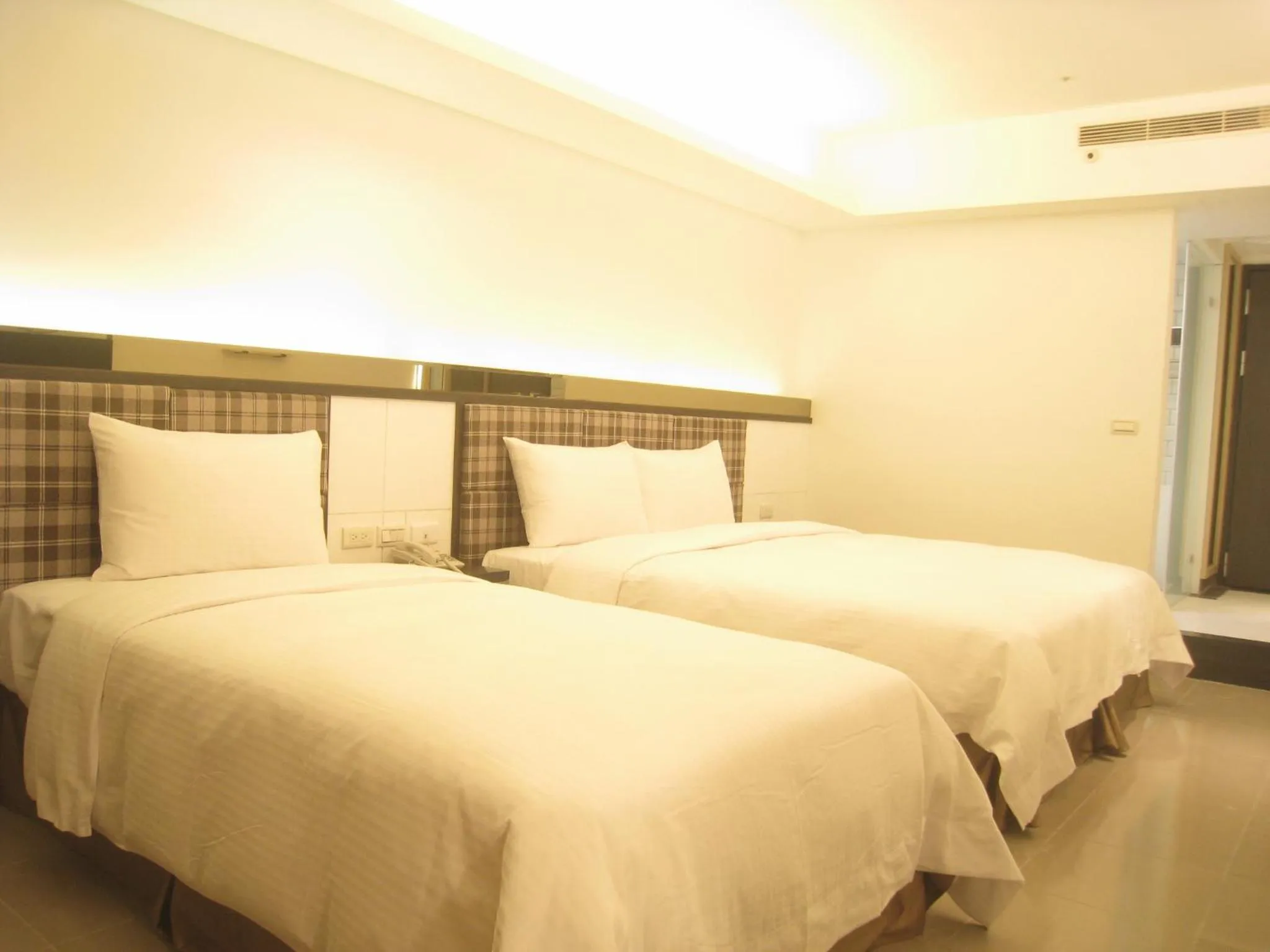 Bed in Formosa Boulerard Garden Hotel