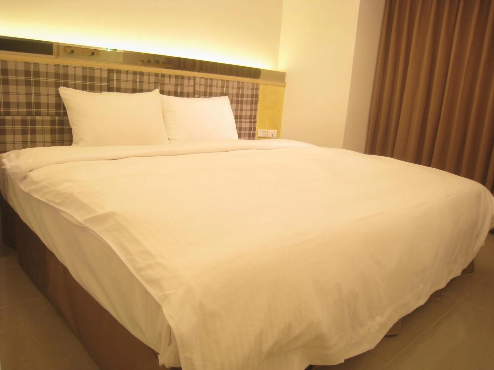 Bed in Formosa Boulerard Garden Hotel