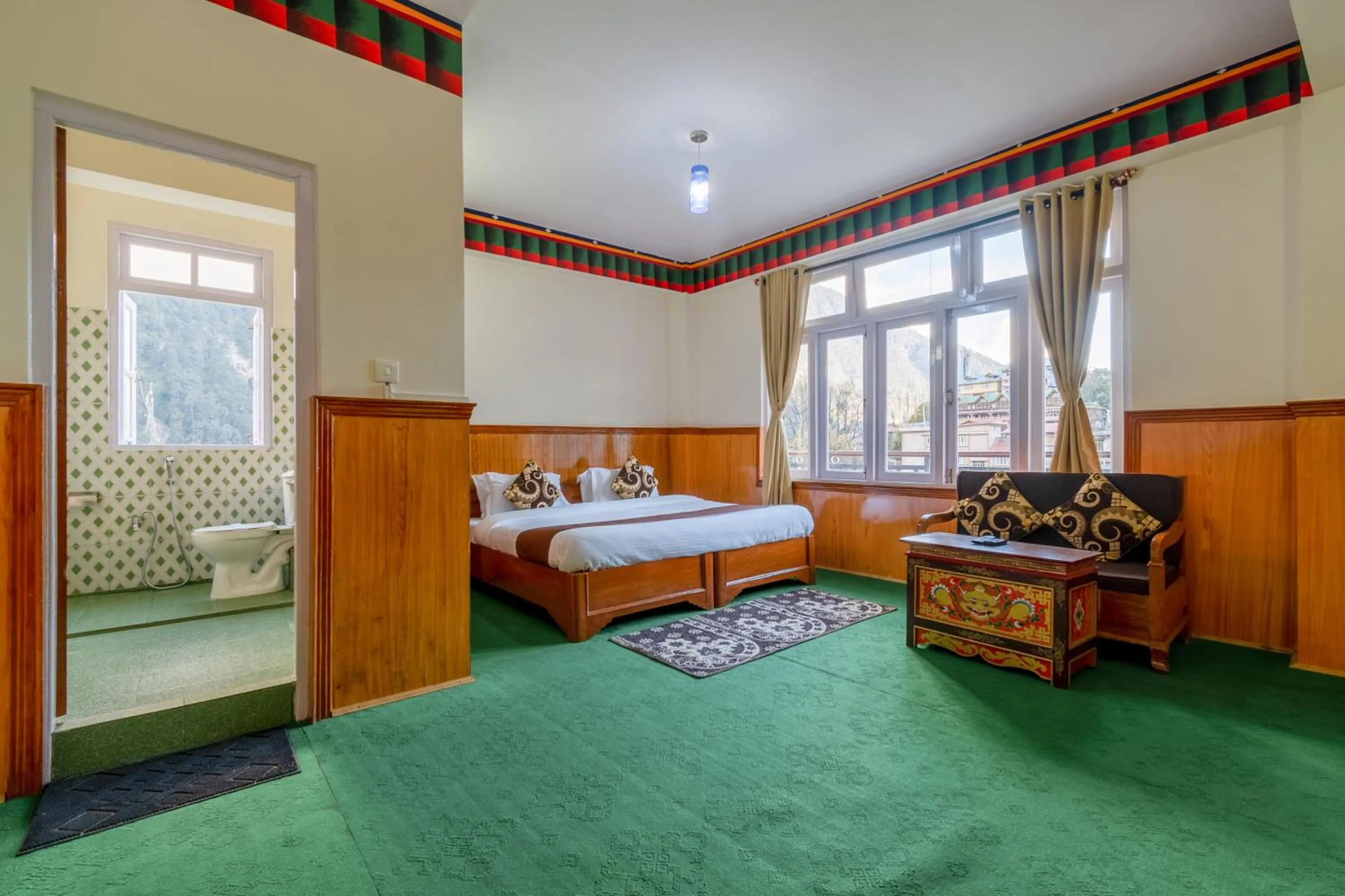 Photo of the whole room, Bed in Magellan's The Grand Lachen