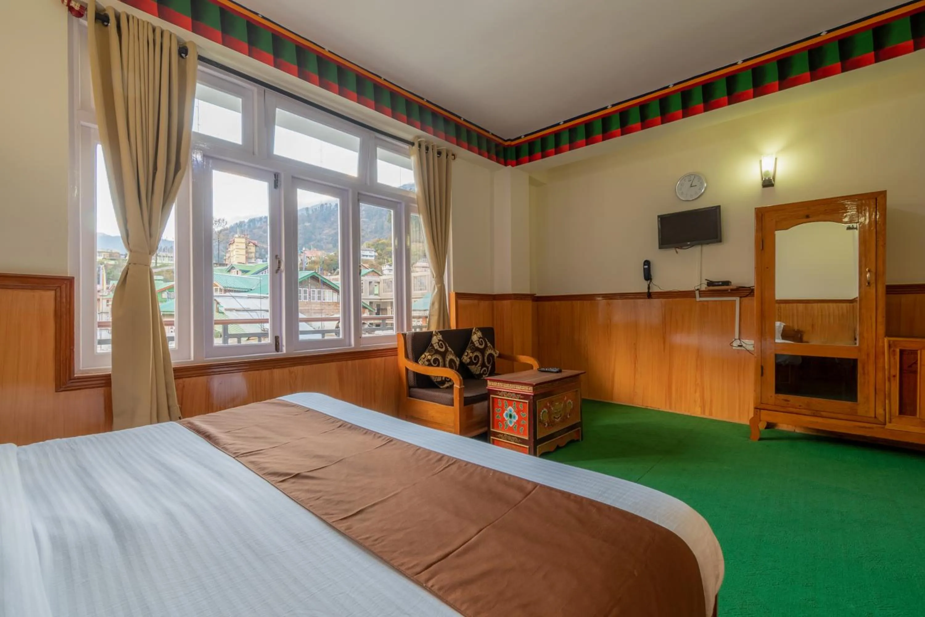 Photo of the whole room, Bed in Magellan's The Grand Lachen