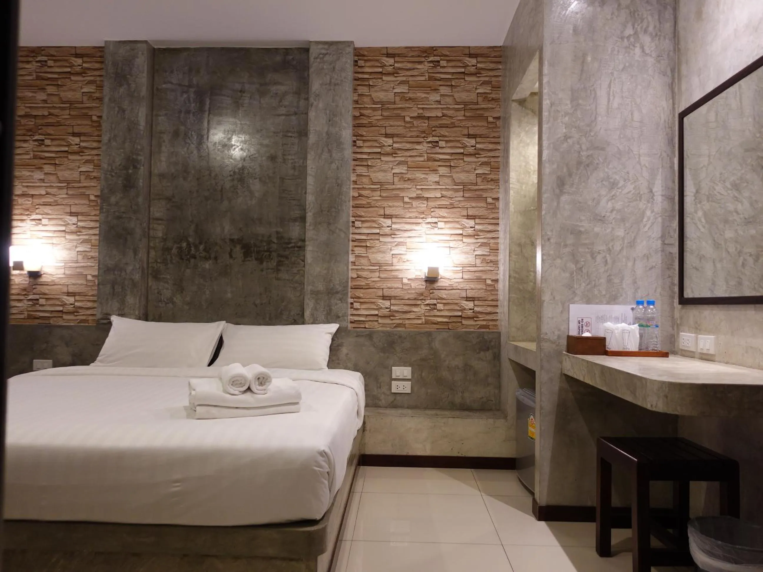 Bed in Ritsurin Boutique Hotel - โรงแรมริทสุริน บูติค