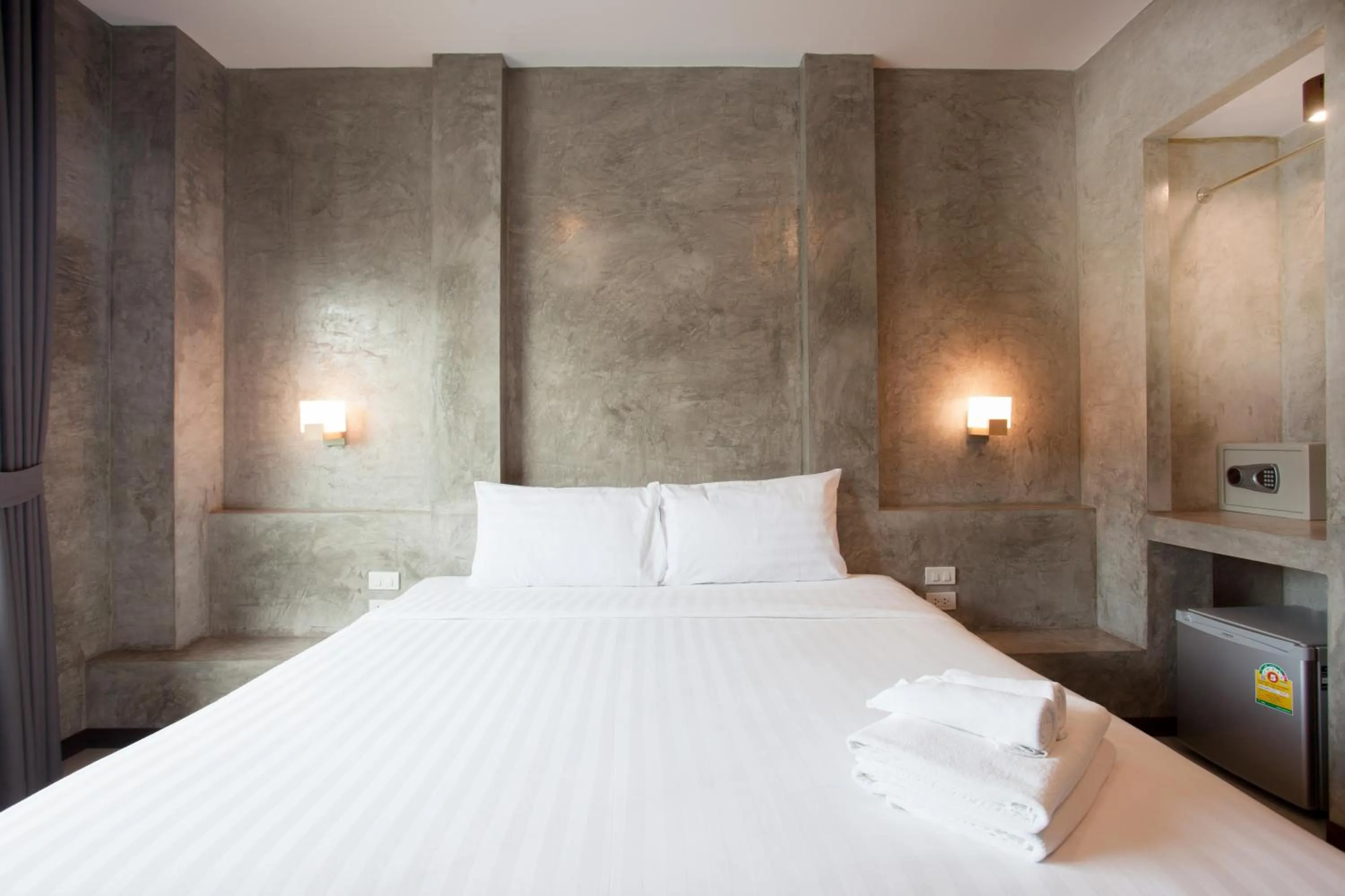 Bed in Ritsurin Boutique Hotel - โรงแรมริทสุริน บูติค