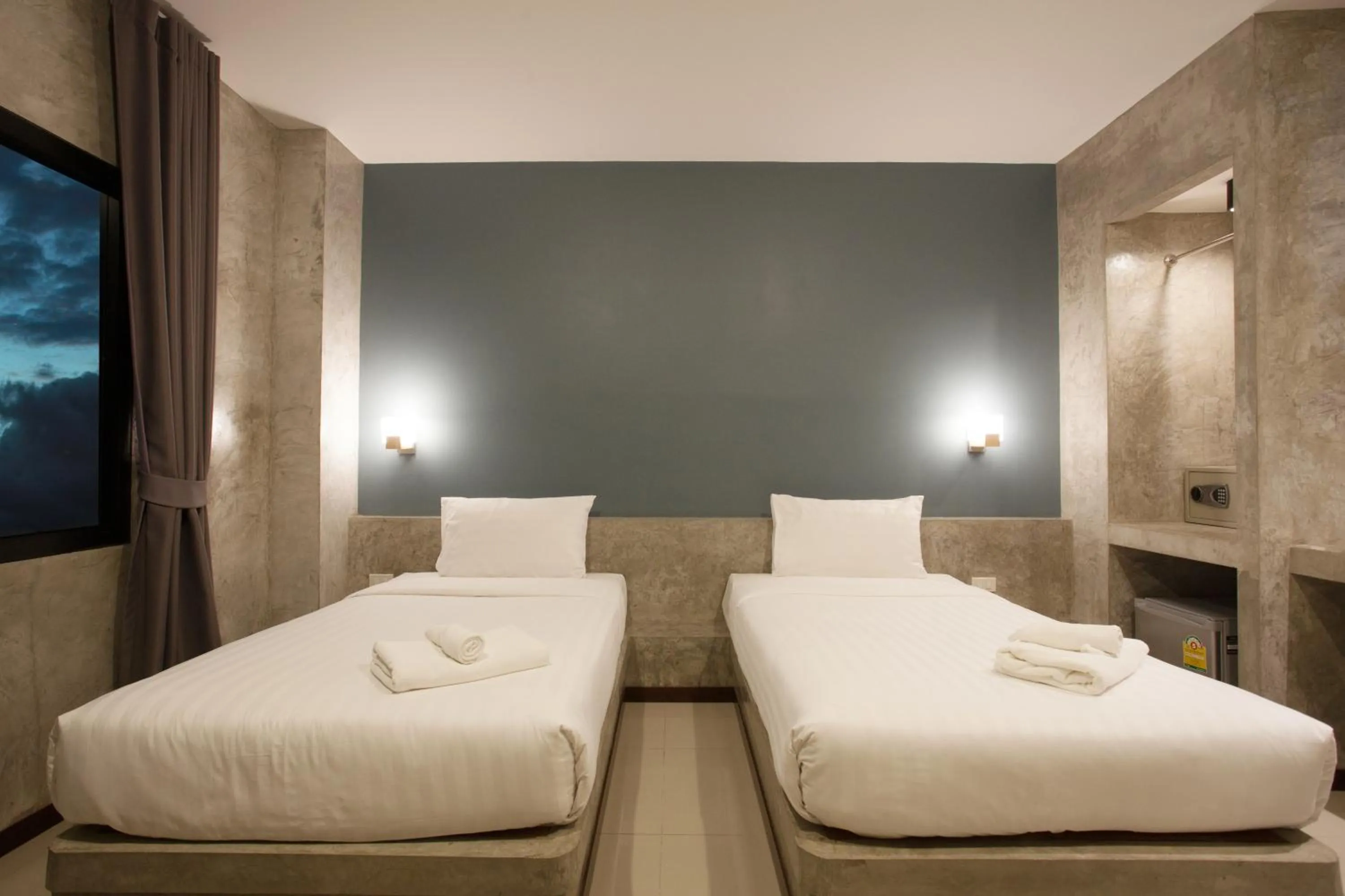 Bed in Ritsurin Boutique Hotel - โรงแรมริทสุริน บูติค