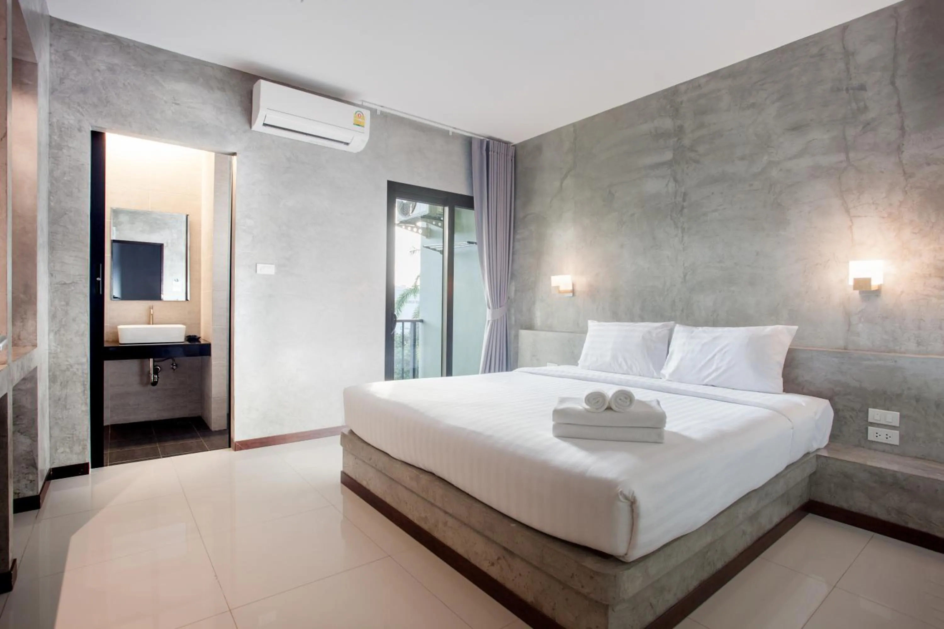 Bed in Ritsurin Boutique Hotel - โรงแรมริทสุริน บูติค