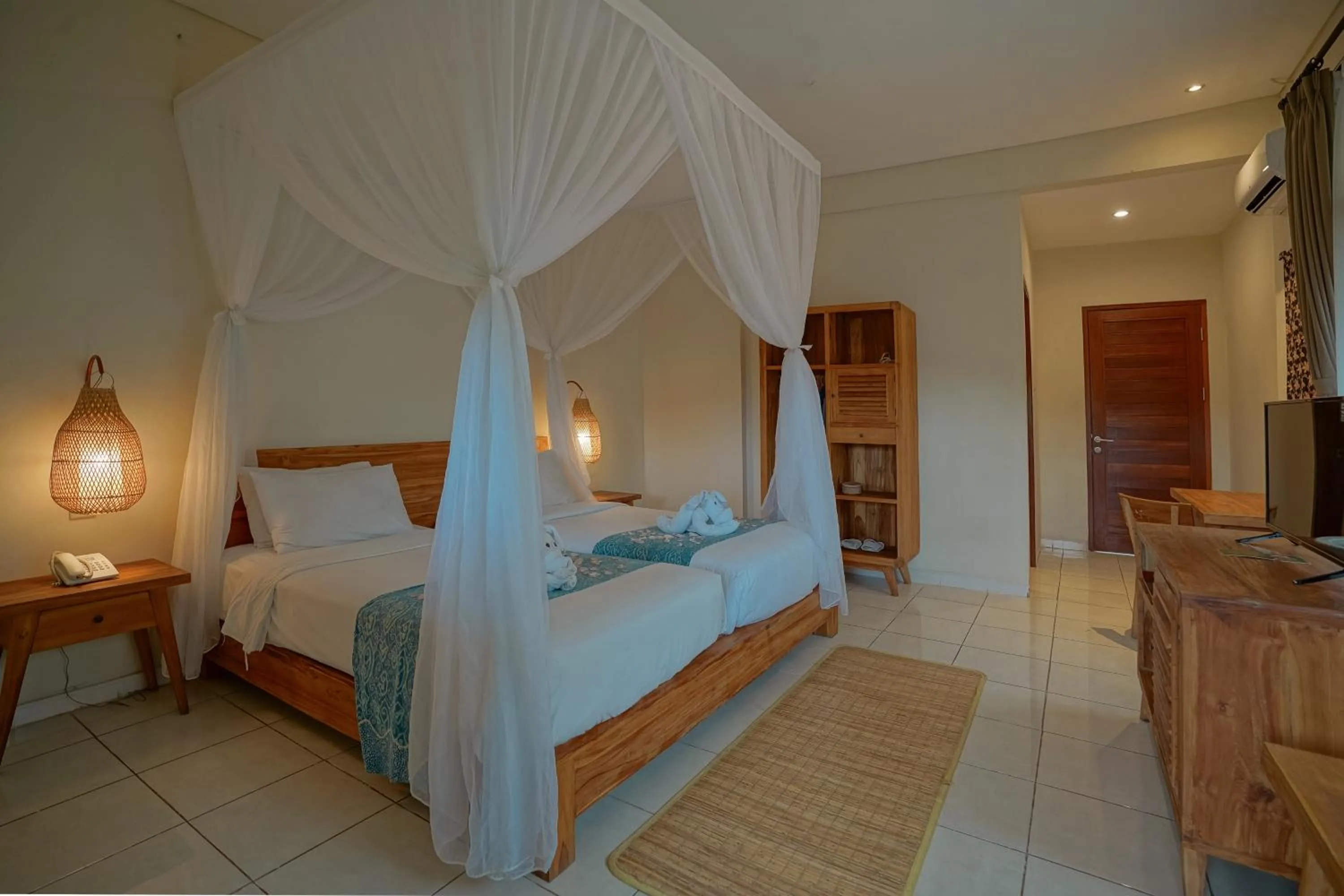 Bed in Pertiwi Resort & Spa