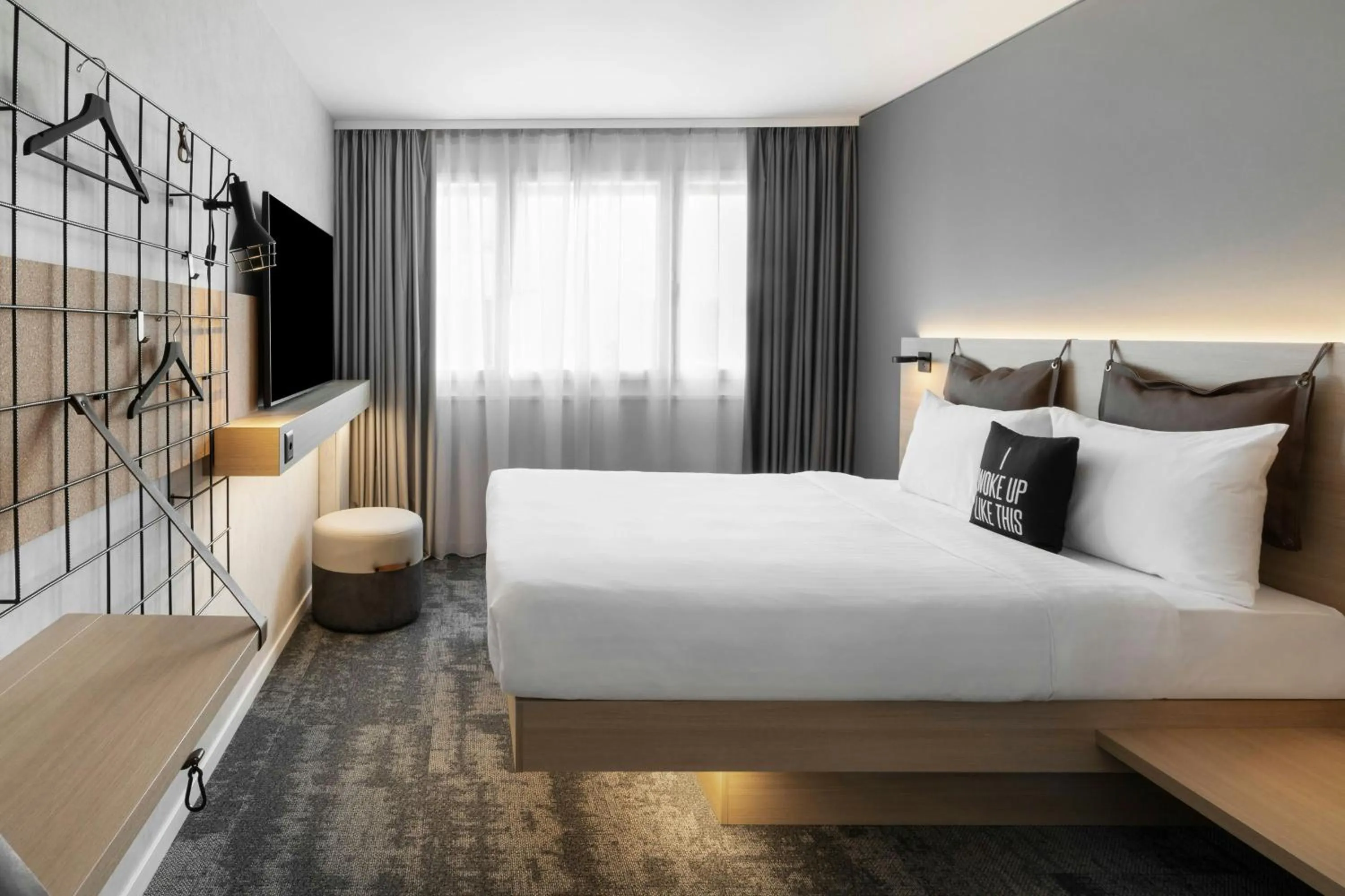 Photo of the whole room, Bed in Moxy Zurich