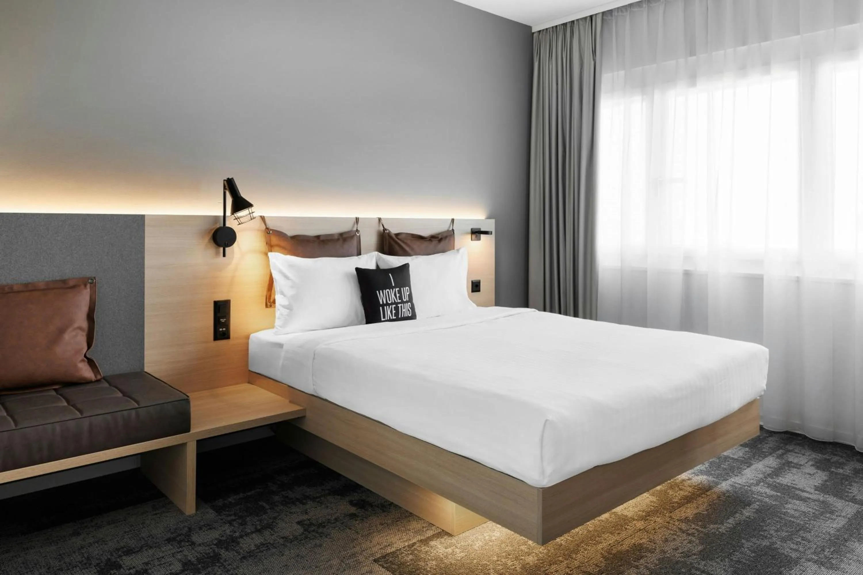 Photo of the whole room, Bed in Moxy Zurich