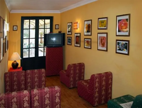Communal lounge/ TV room in Hotel Miranda