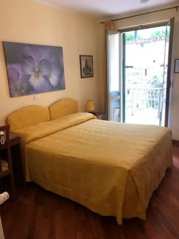 Bed in Hotel Miranda