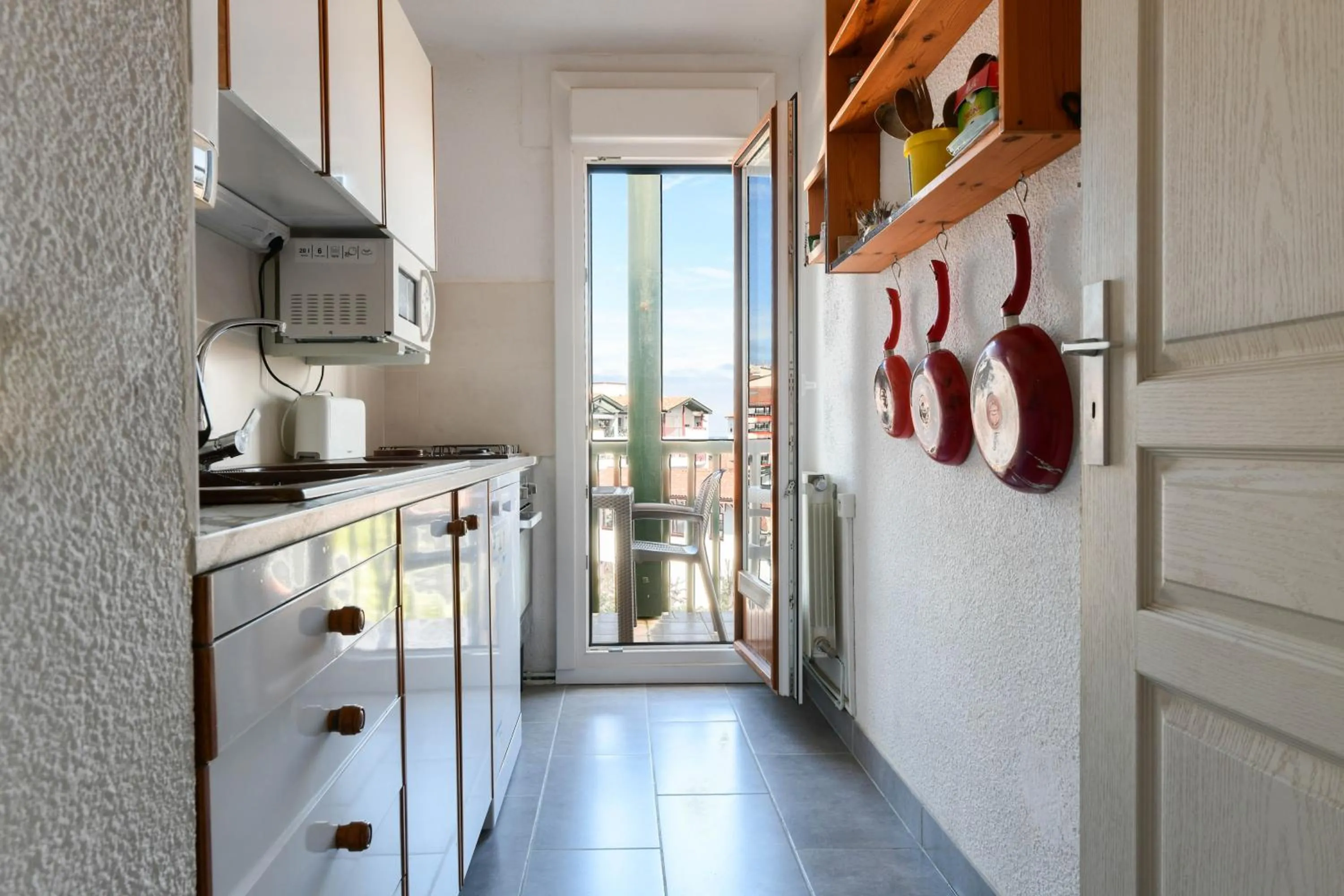 Kitchen or kitchenette in Logis Hotel & Restaurant Bergeret Sport